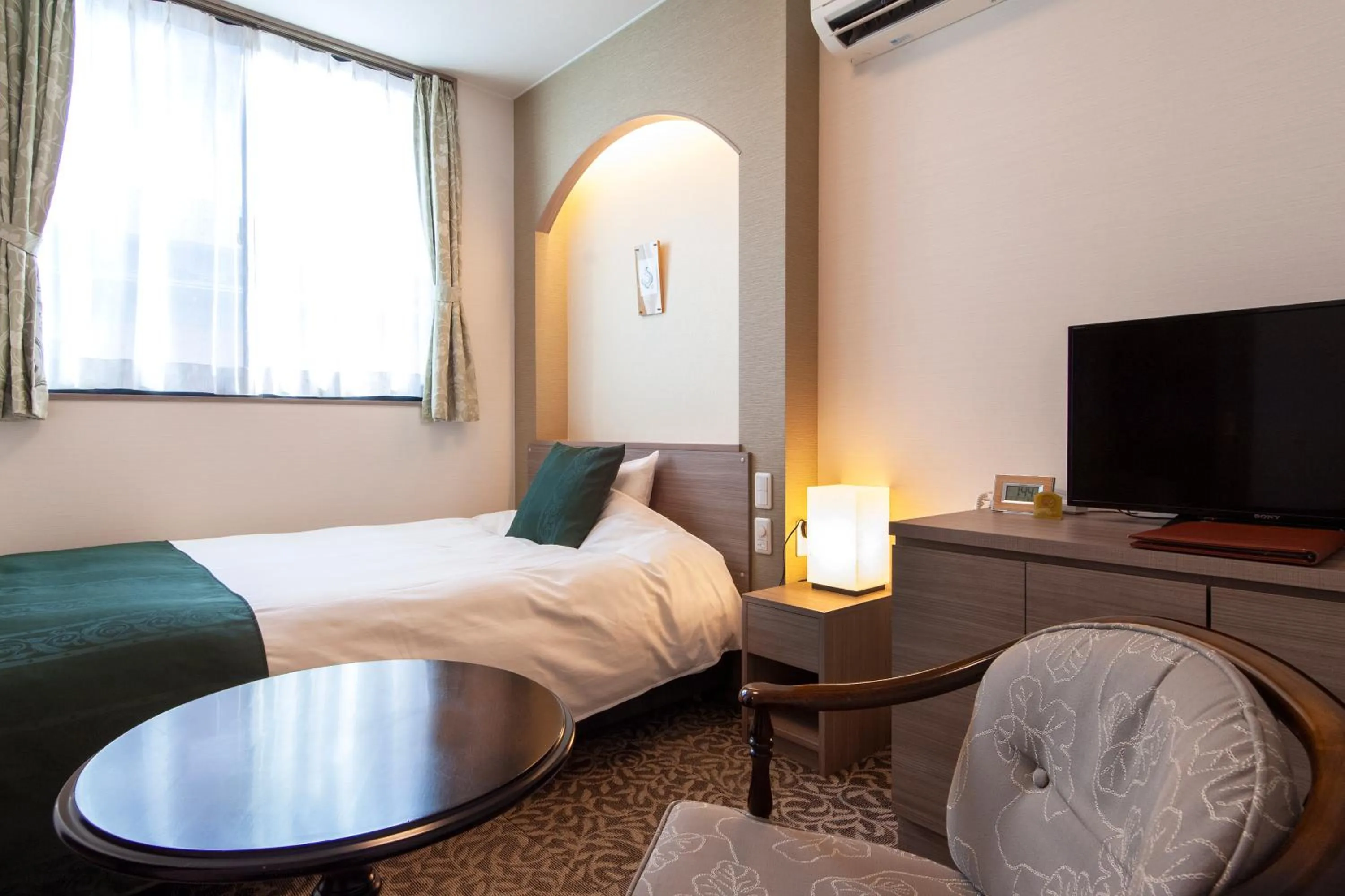 Communal lounge/ TV room, Bed in Oyado Yukizumi