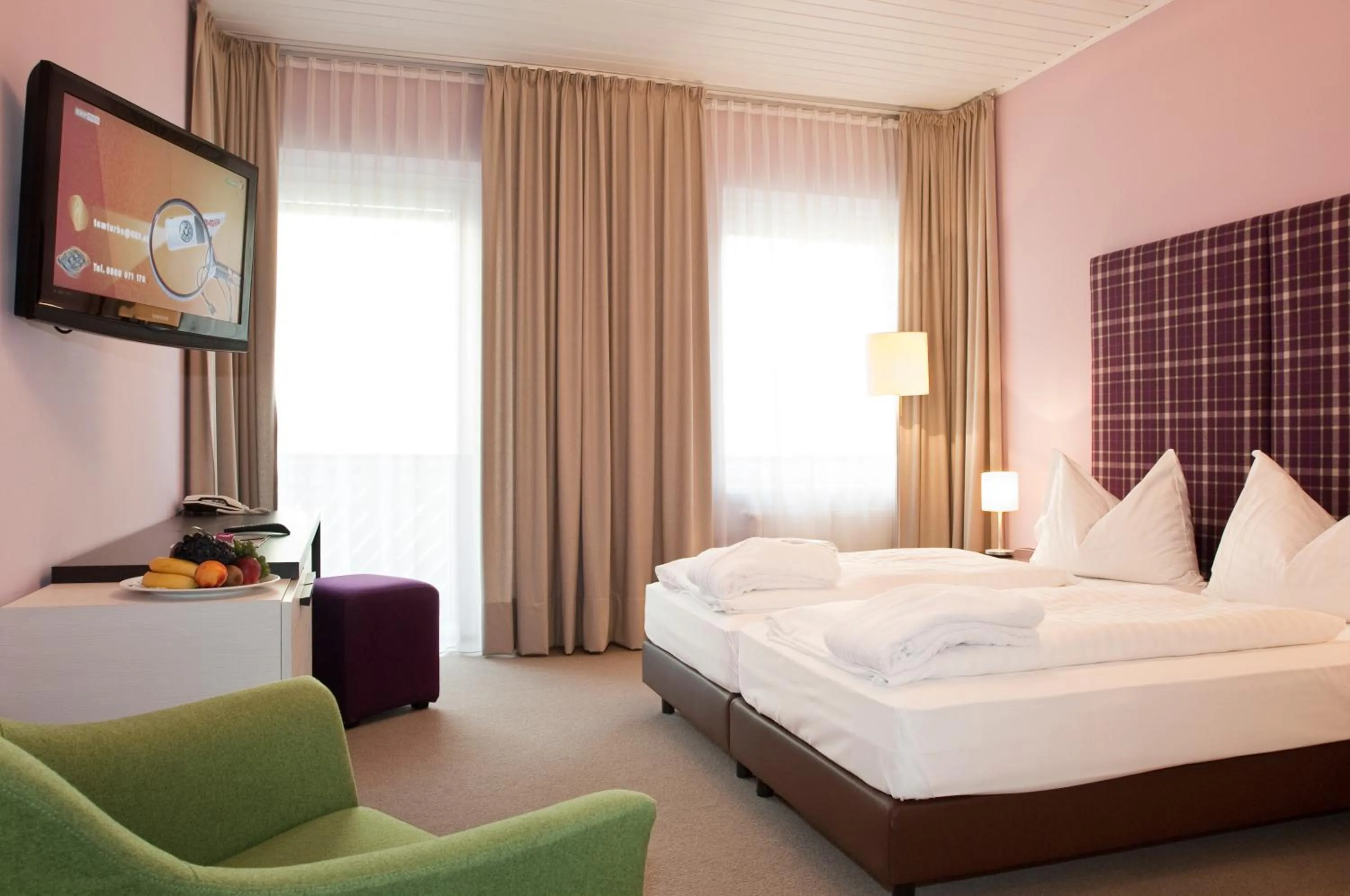 Bed in AKTIVHOTEL Weisser Hirsch