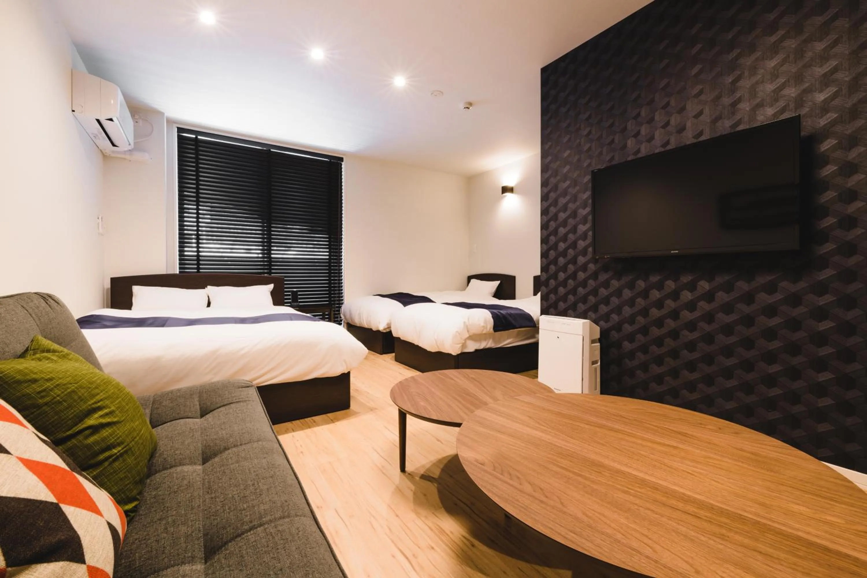 Living room, Bed in Trip Base HAKATAEKIMAE