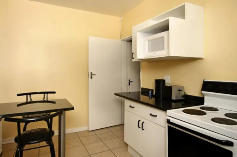Kitchen or kitchenette in Vetho 1 Apartments OR Tambo Airport