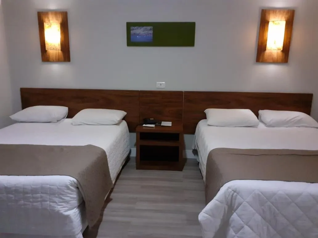Bed in Hotel Le Canard Lages