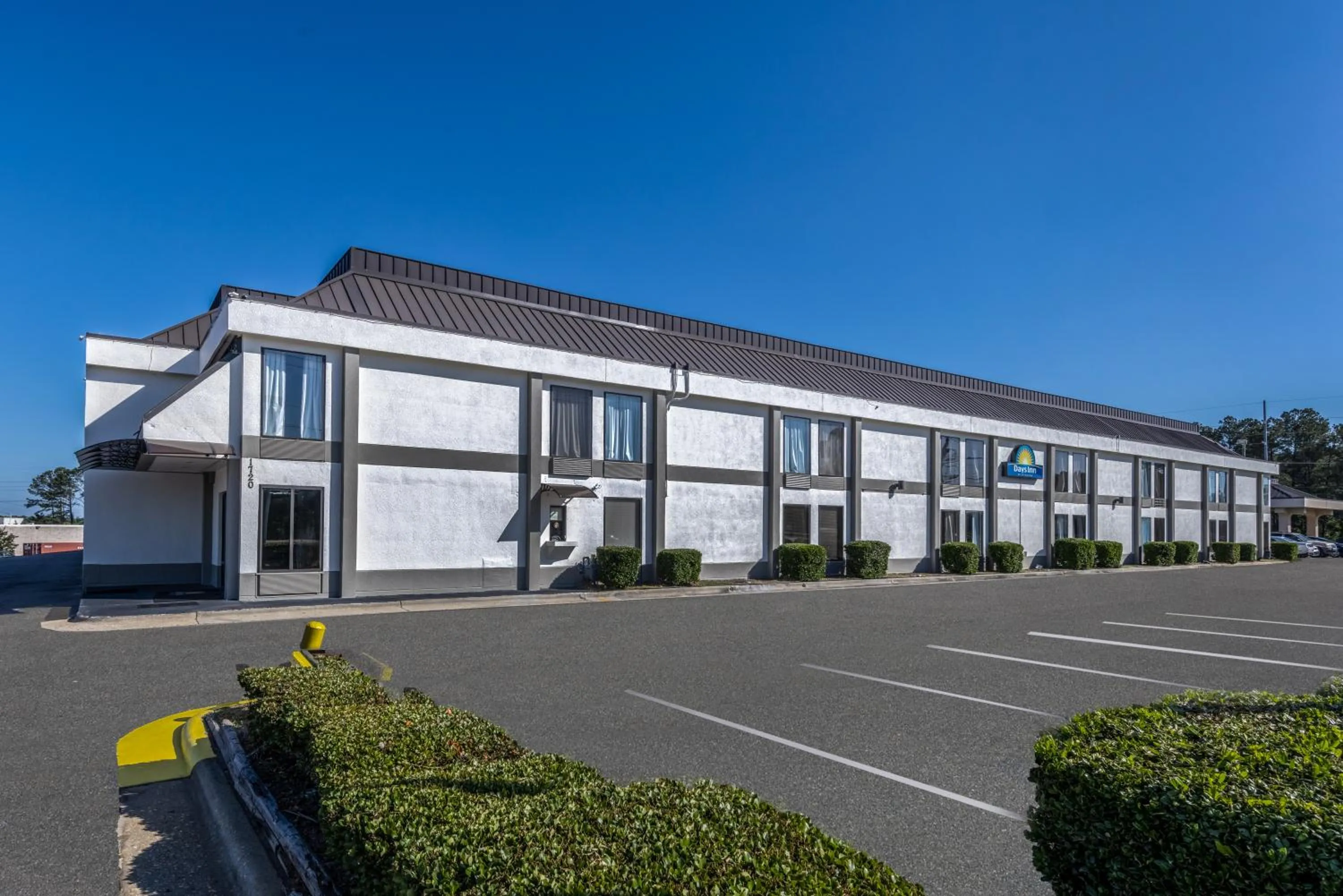 Property building in Days Inn & Suites by Wyndham Fort Bragg/Cross Creek Mall