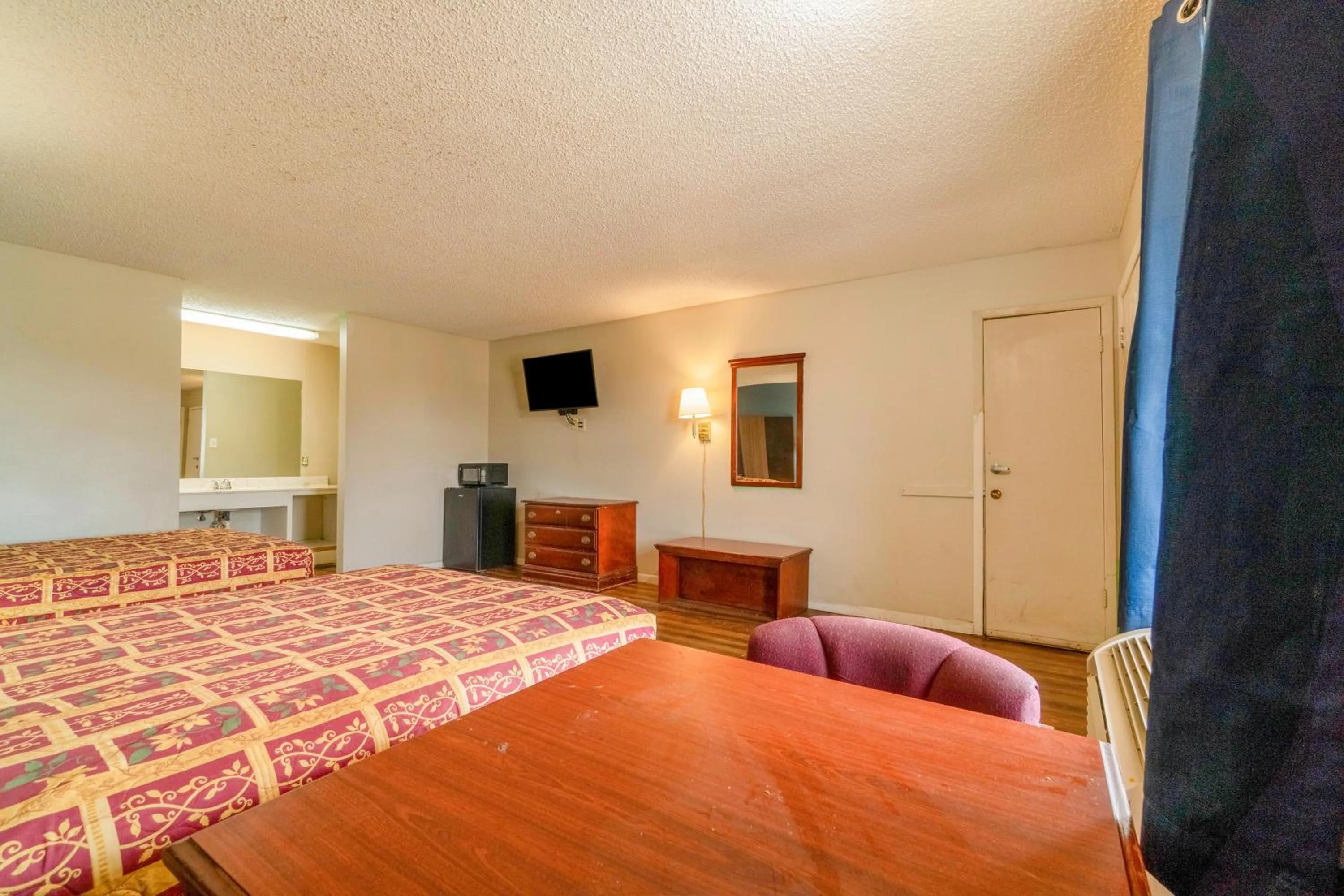 Bedroom, Bed in Executive Inn By OYO Mineral Wells US-180