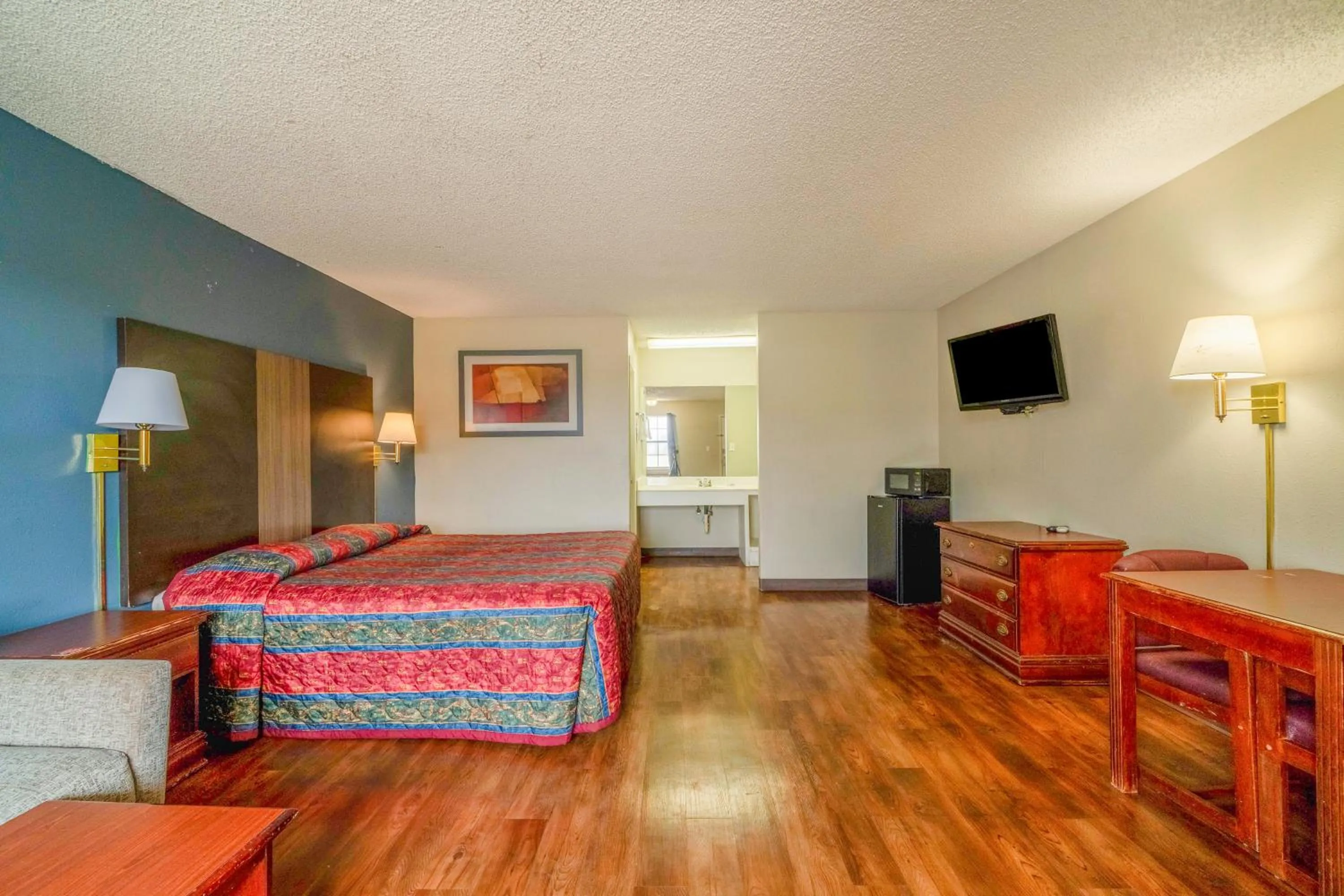 Bedroom, Bed in Executive Inn By OYO Mineral Wells US-180