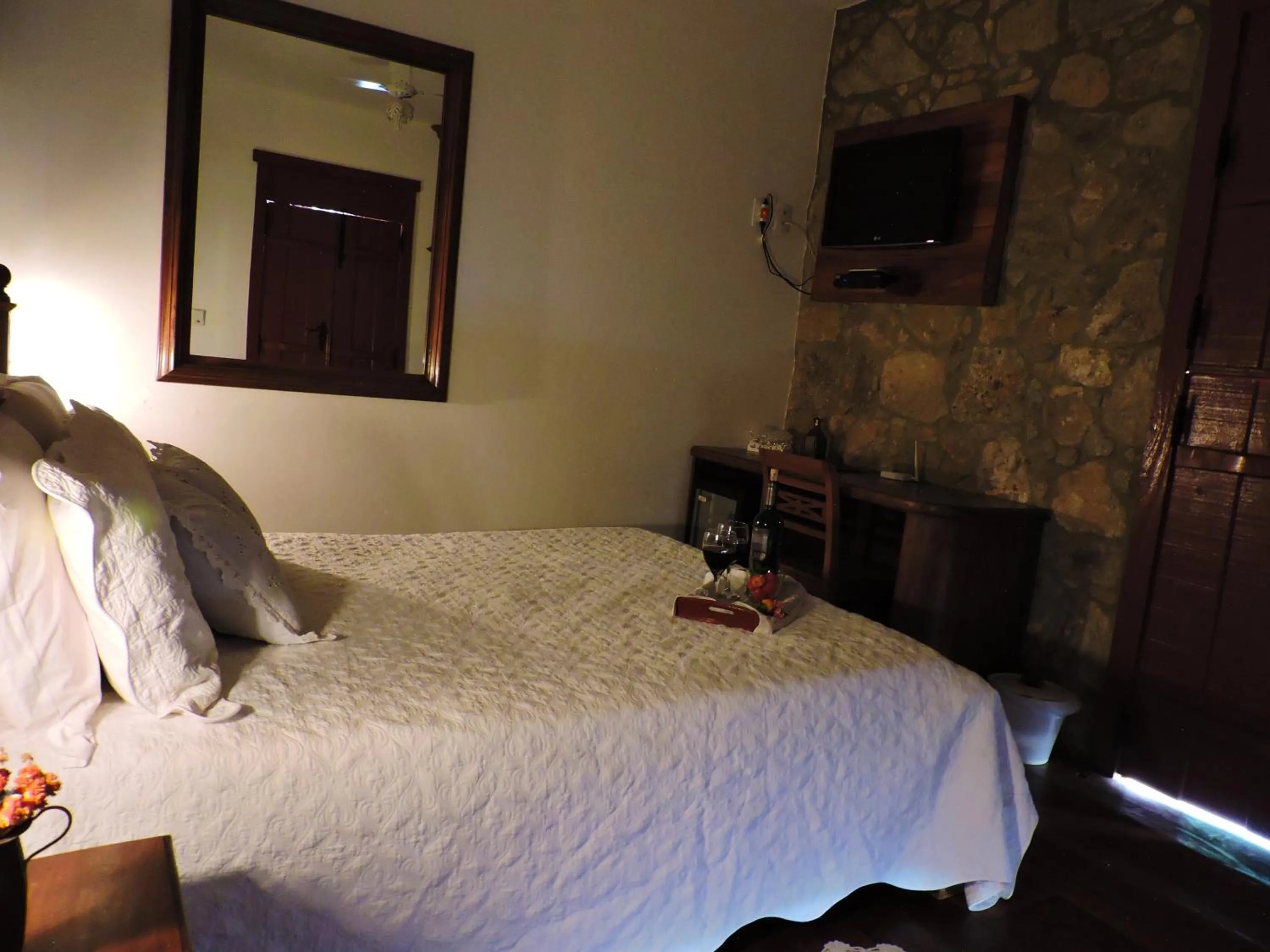 Bed in Pousada Araujo Bazilio