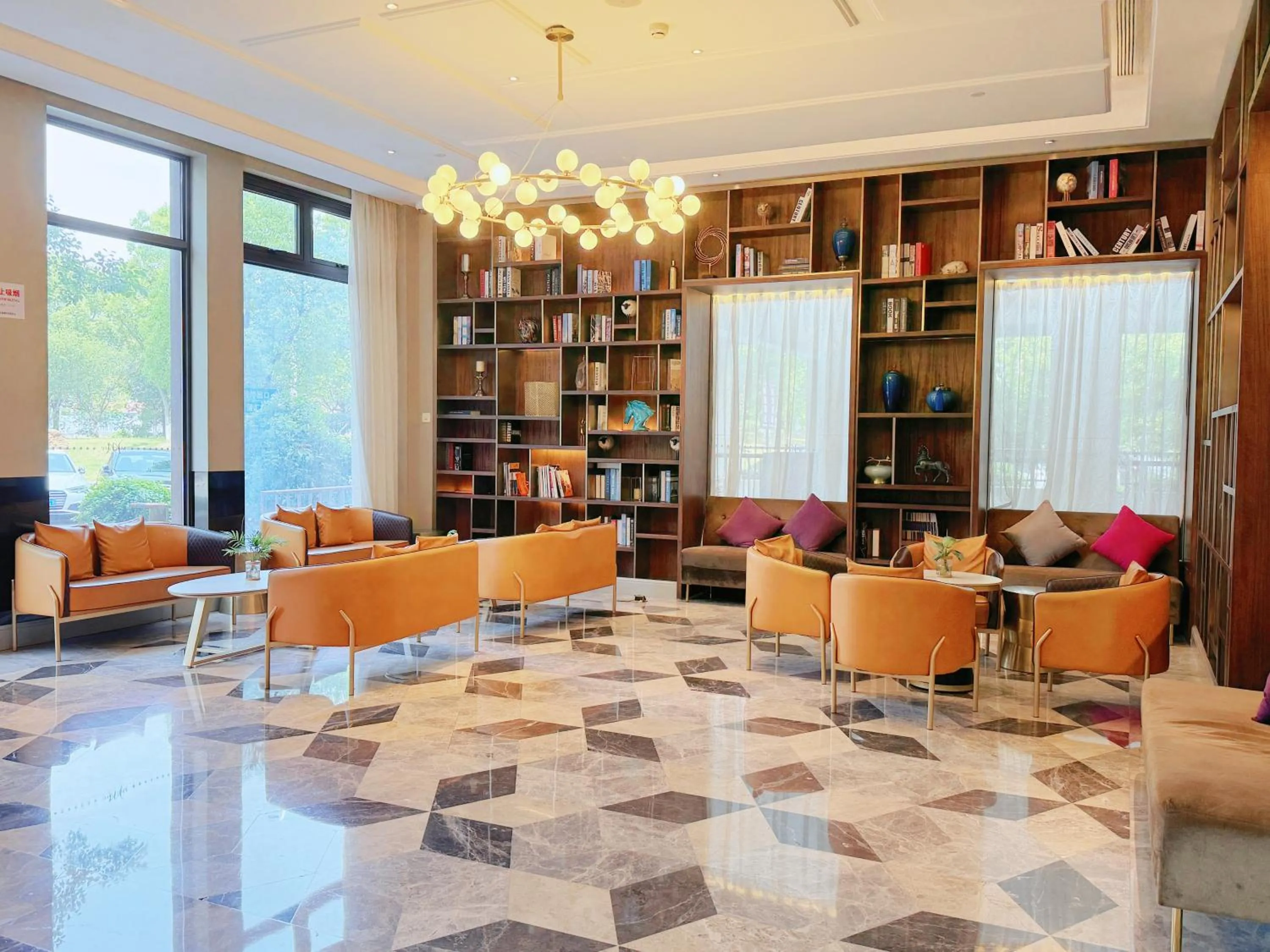 Communal lounge/ TV room in Mercure Shanghai Jiuting