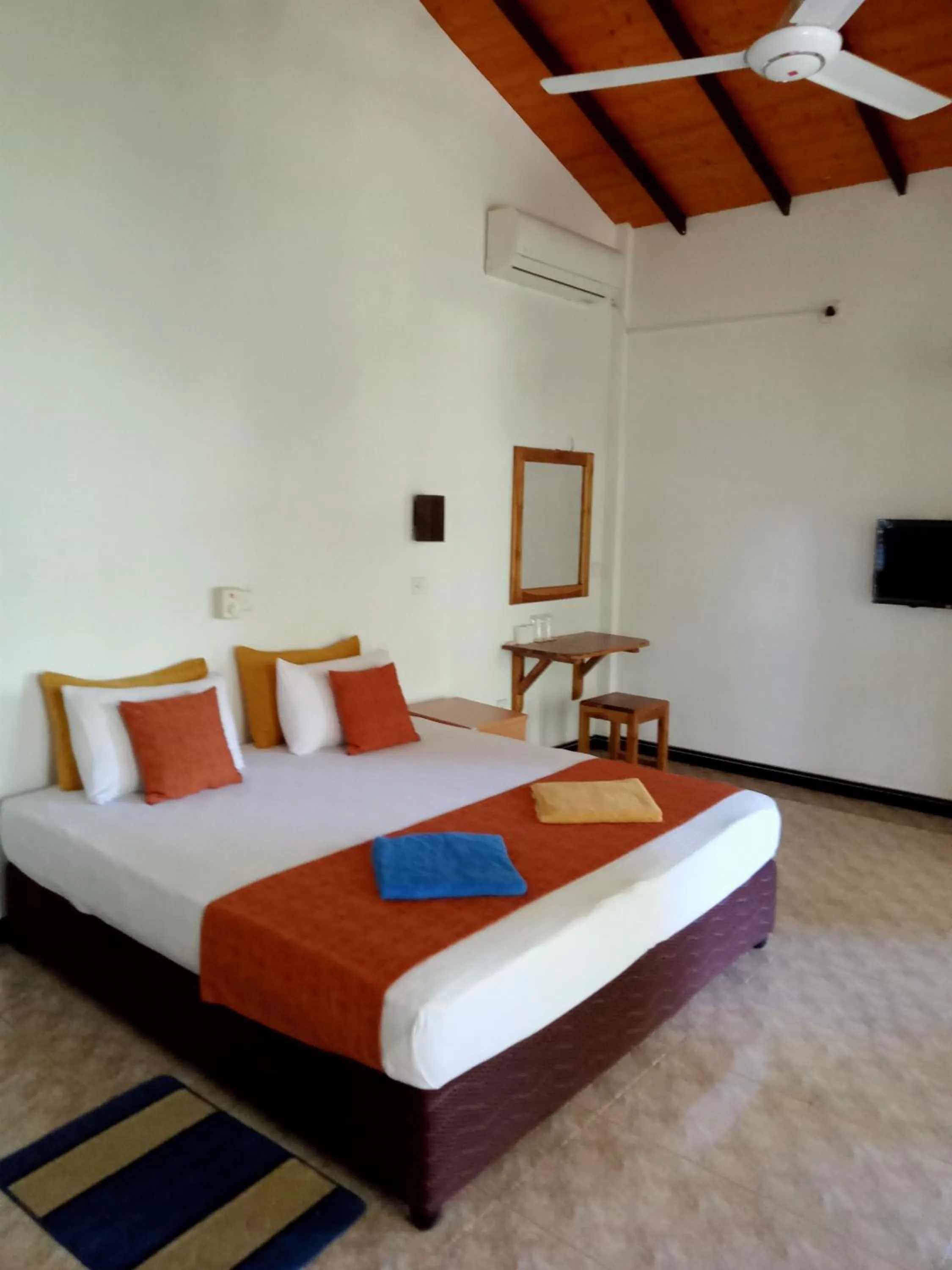 Bed in Kithmi Resort