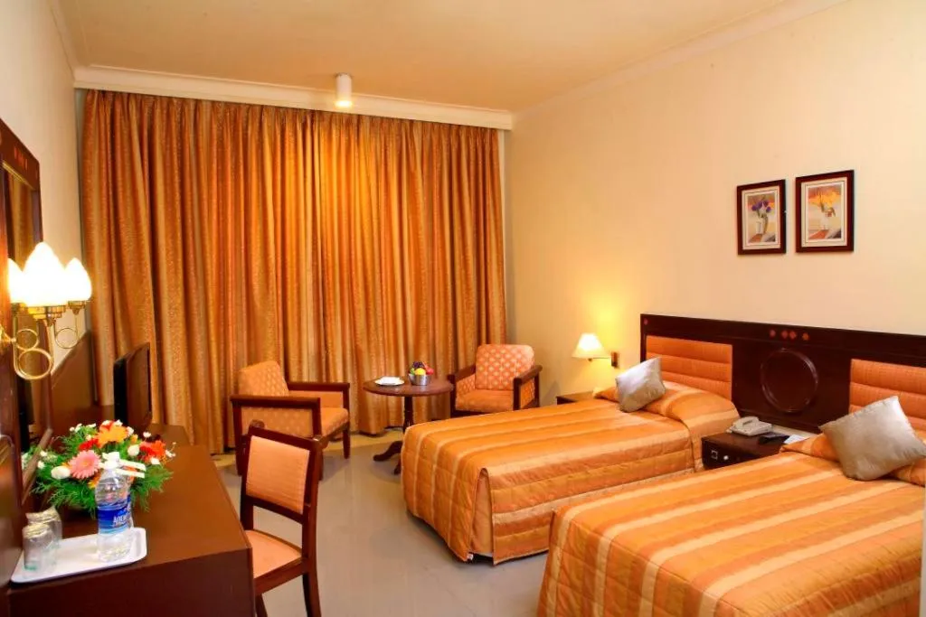 Bed in Sangam Hotel, Thanjavur