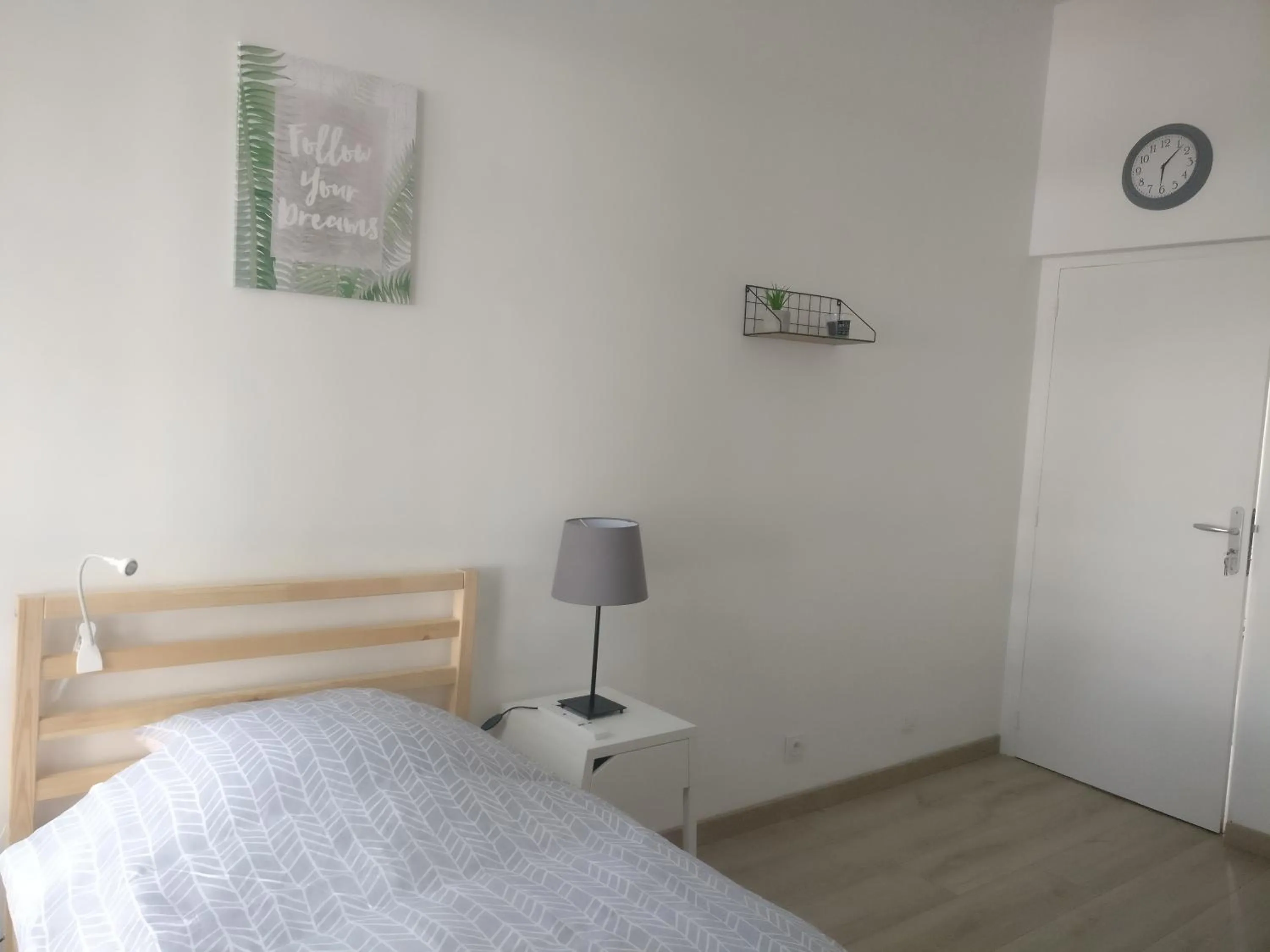 Bed in Appart Hôtel L'Angélique