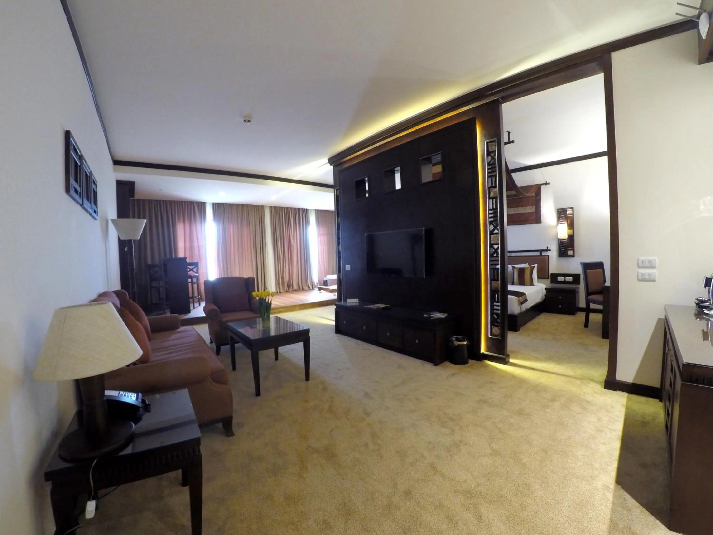 Communal lounge/ TV room in Africana Hotel & Spa