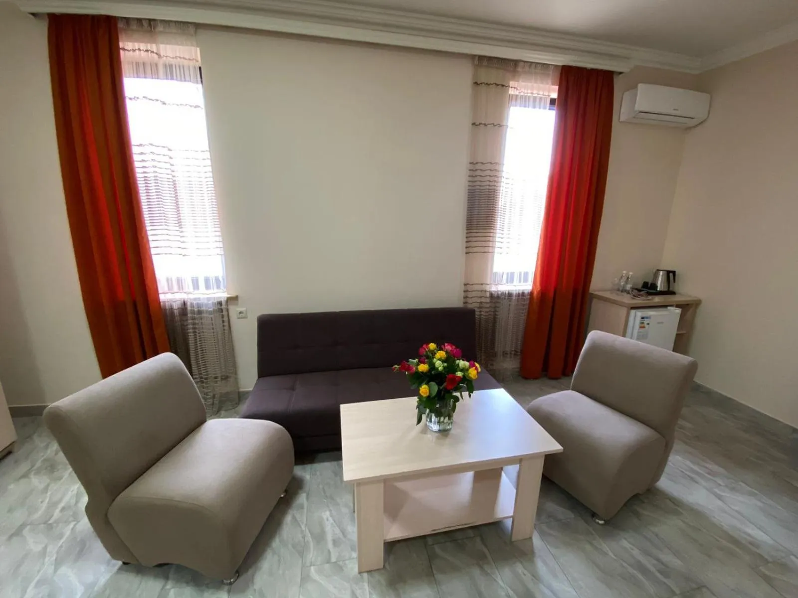 Seating area in Alex Hotel