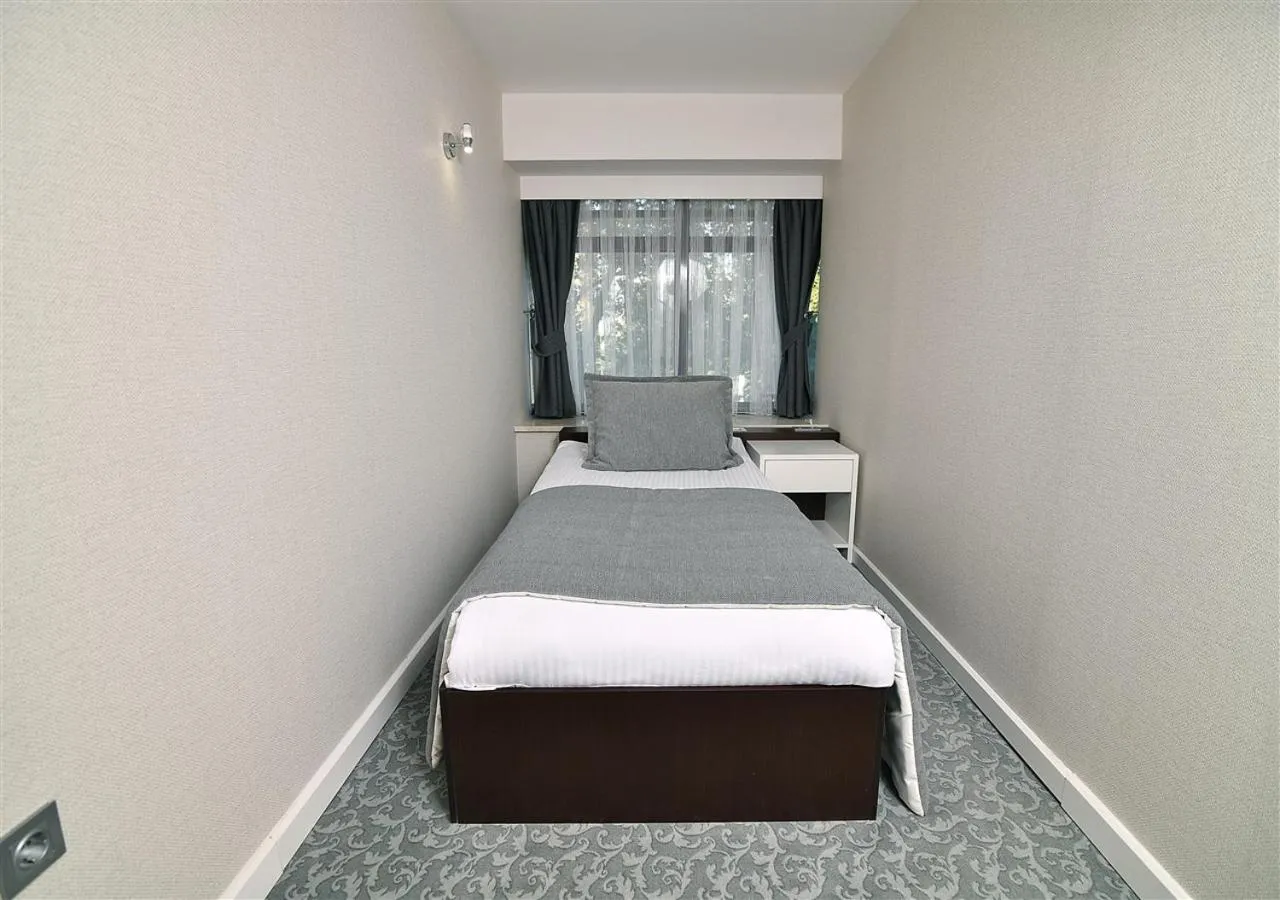 Bedroom, Bed in Güvenay Business Hotel