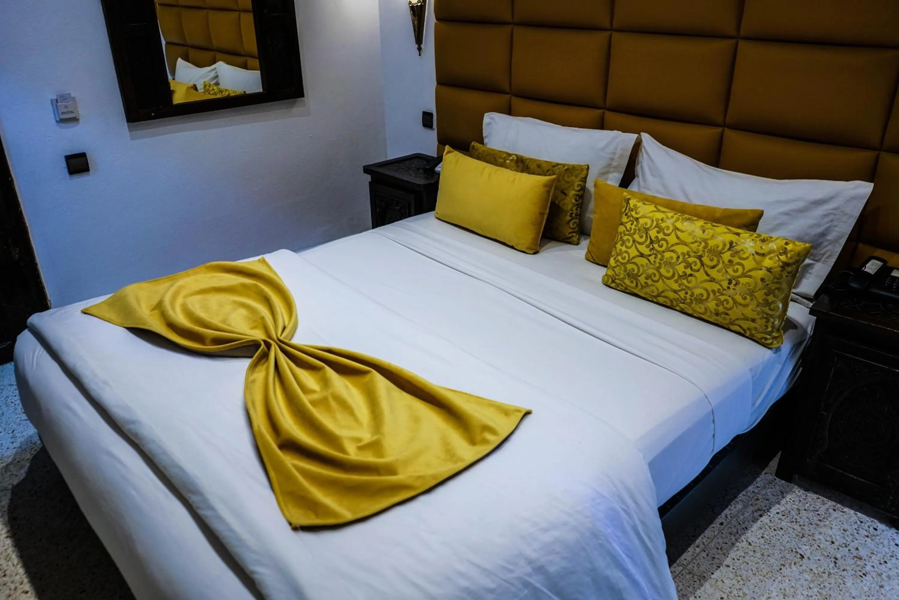 Bed in Hotel La Perle du Sud