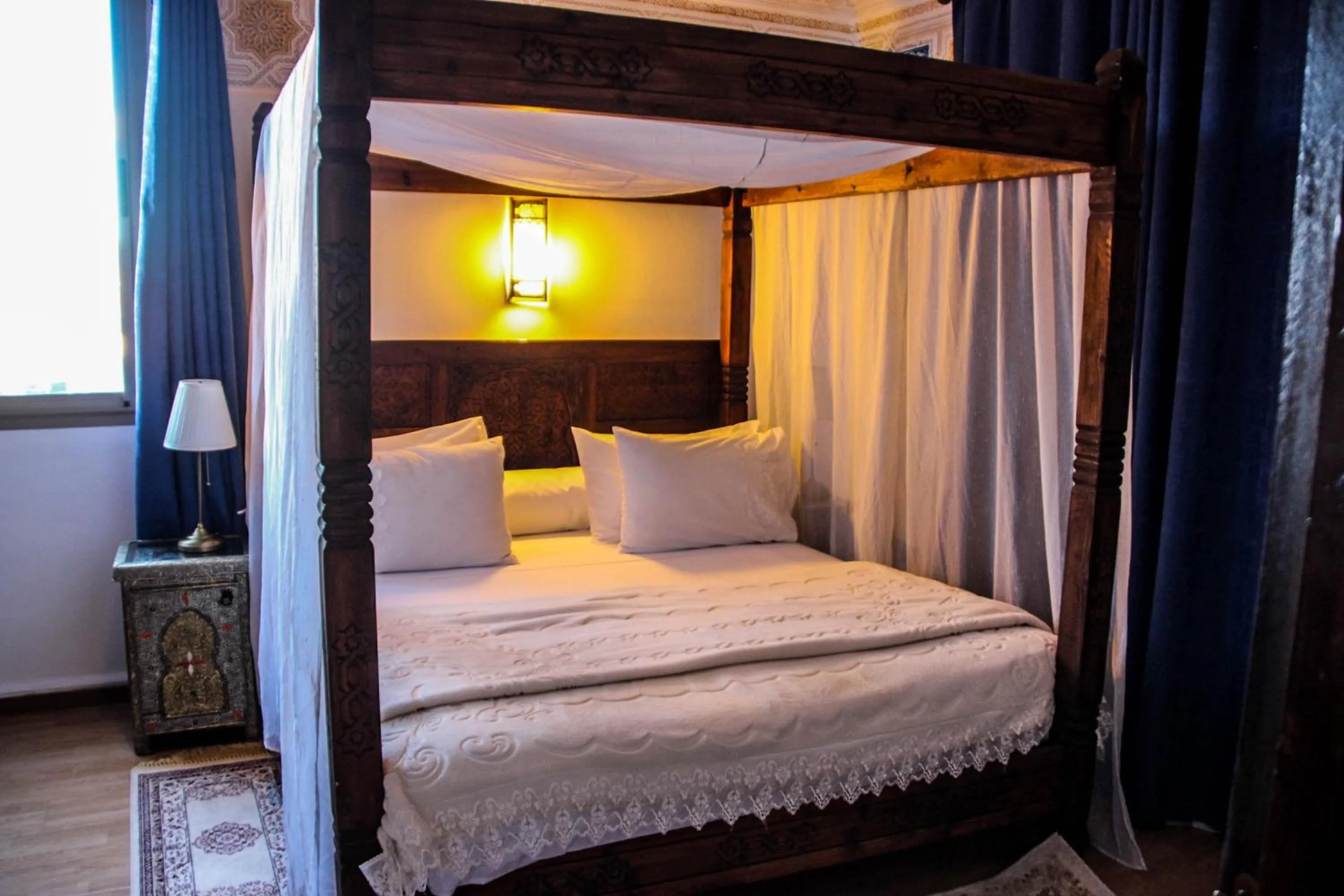 Bed in Hotel La Perle du Sud