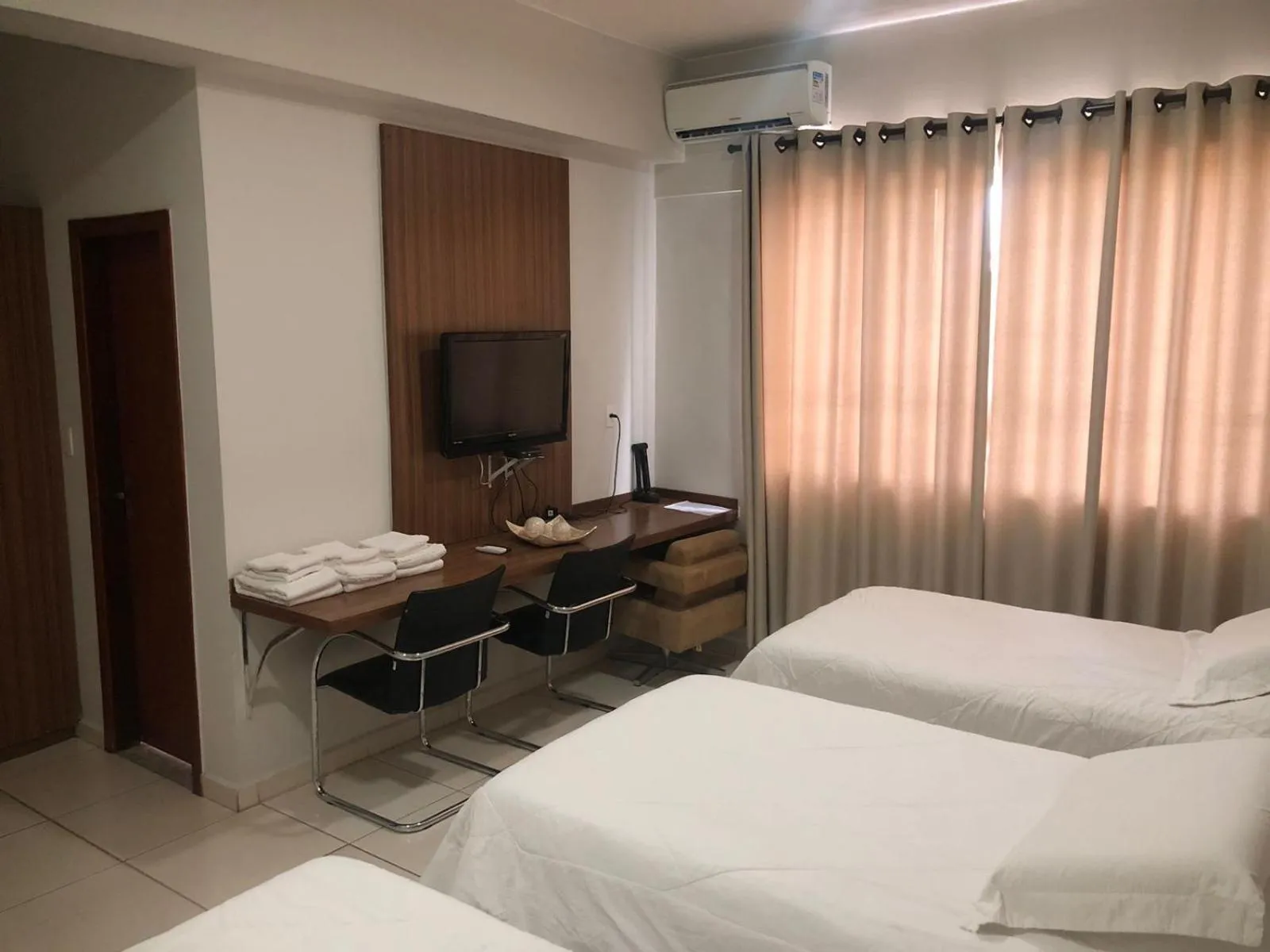 Bed in Paracatu Plaza Hotel