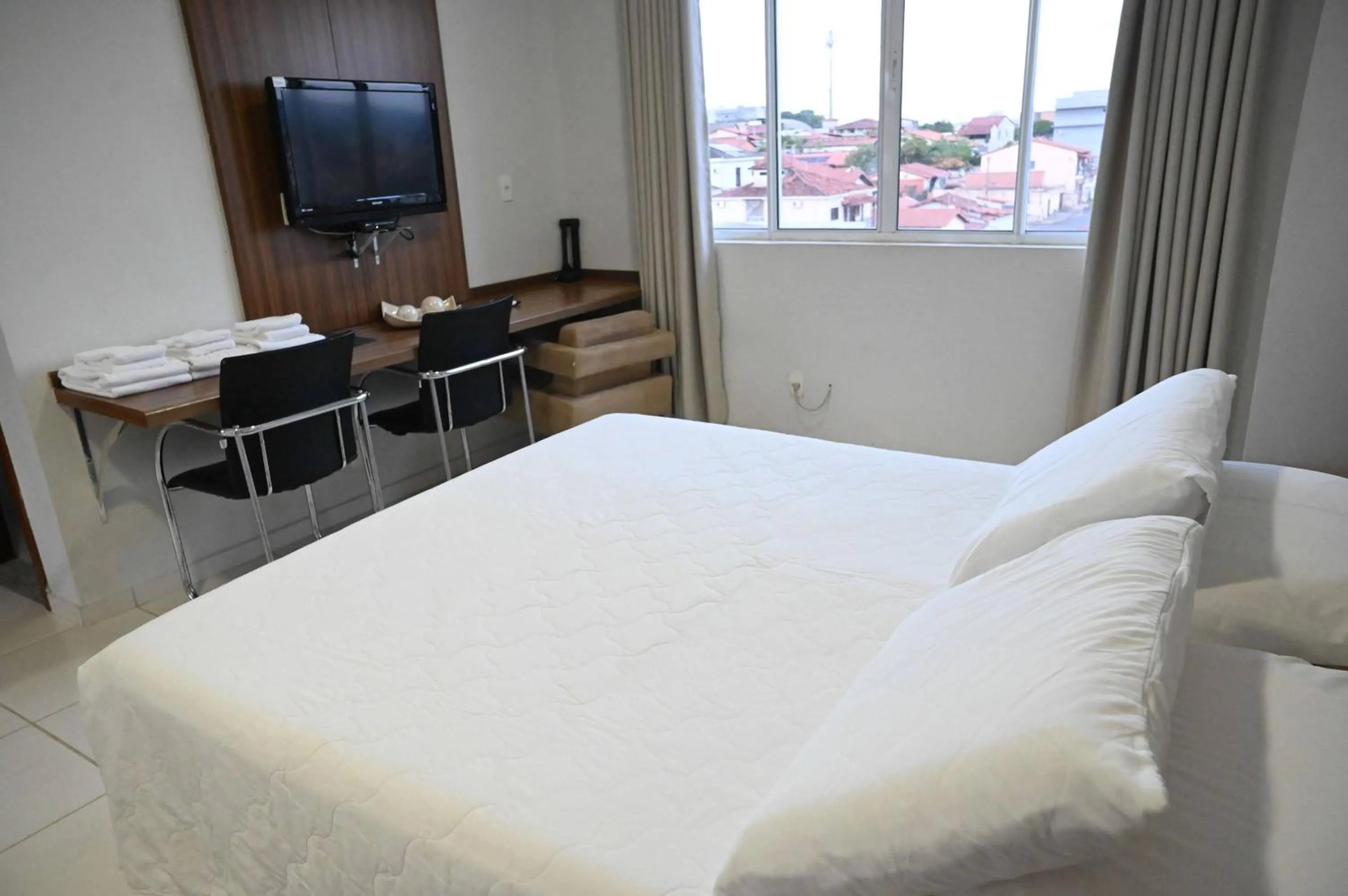 Bed in Paracatu Plaza Hotel