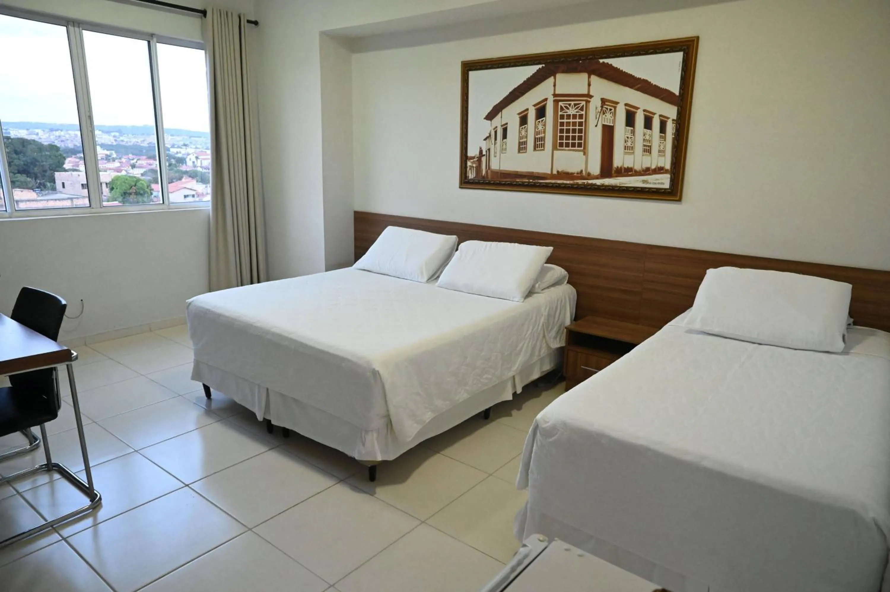 Bed in Paracatu Plaza Hotel