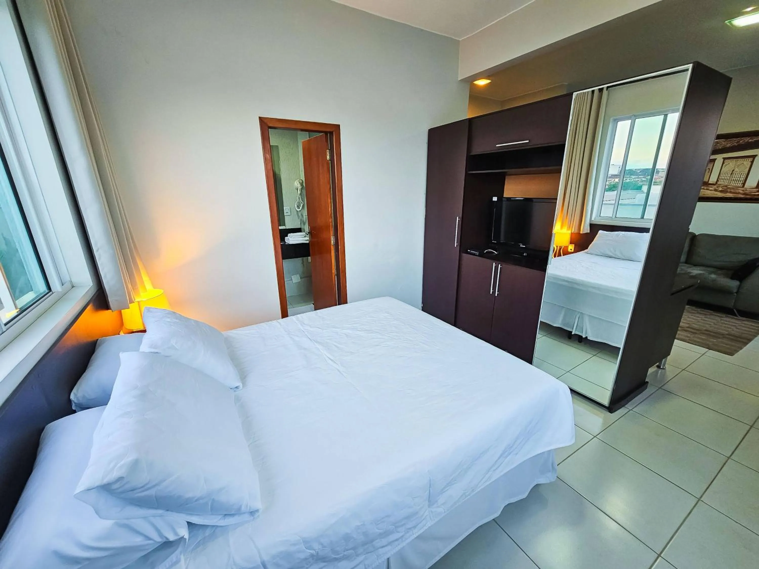 Bed in Paracatu Plaza Hotel
