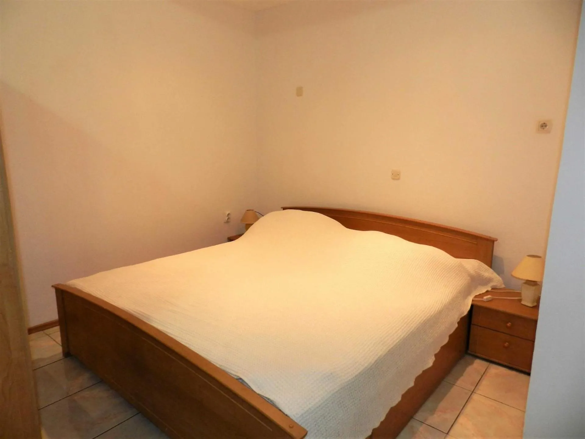 Bed in Apartments Lea