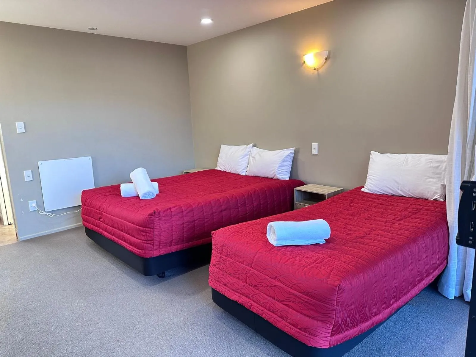 Bed in Heritage Court Lodge Oamaru