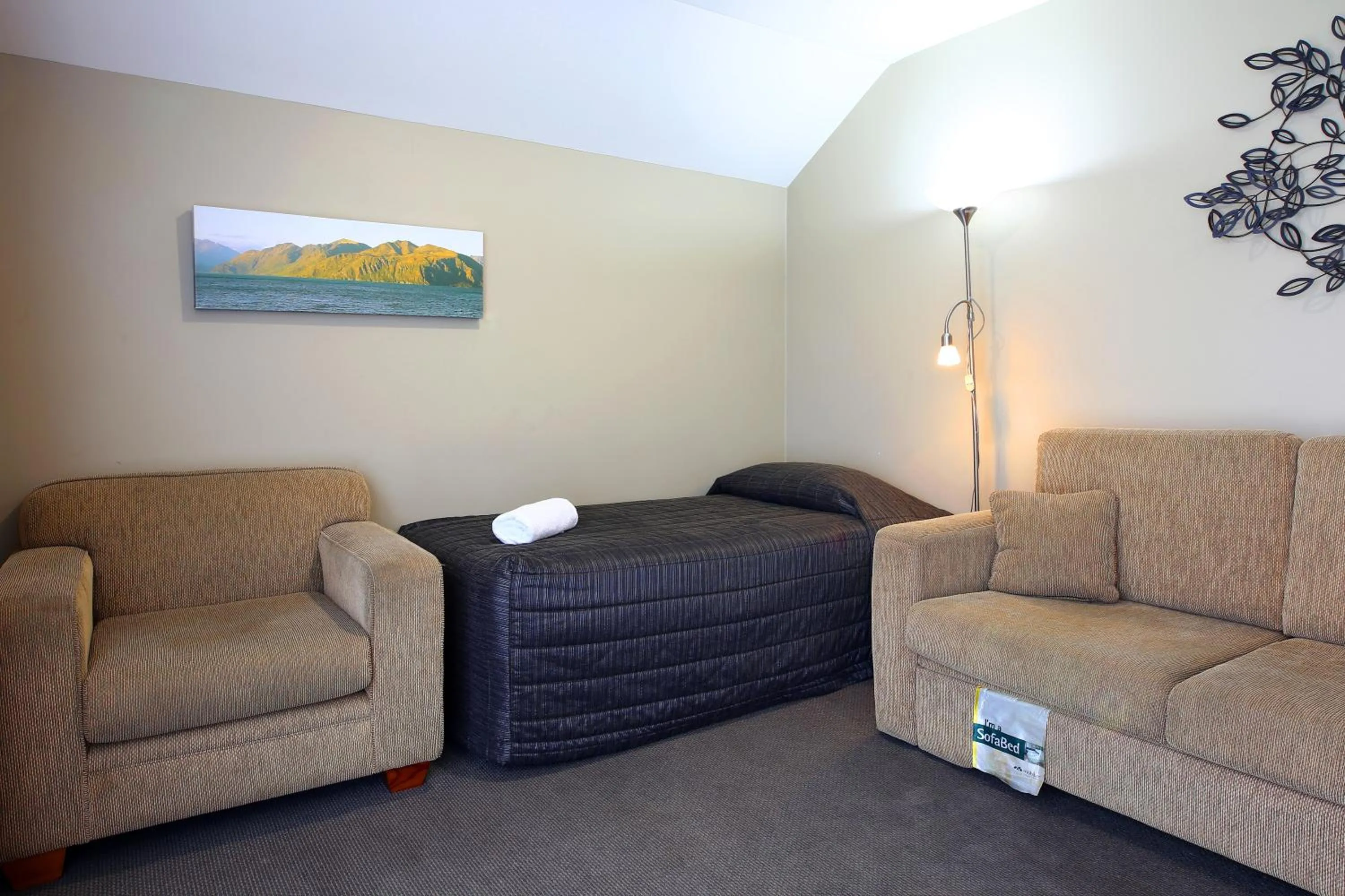 Bed in Heritage Court Lodge Oamaru