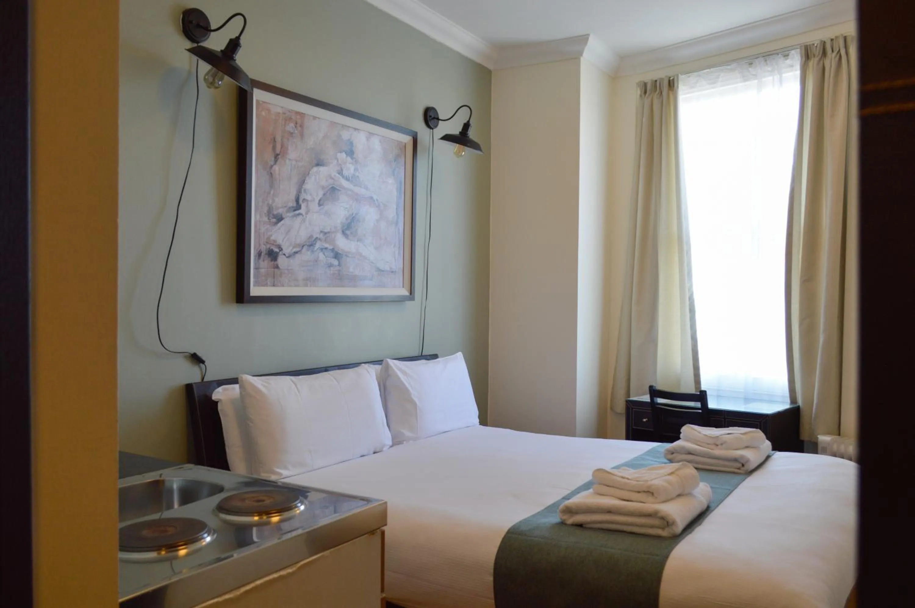 Bed in The Royale Chulan Hyde Park Hotel