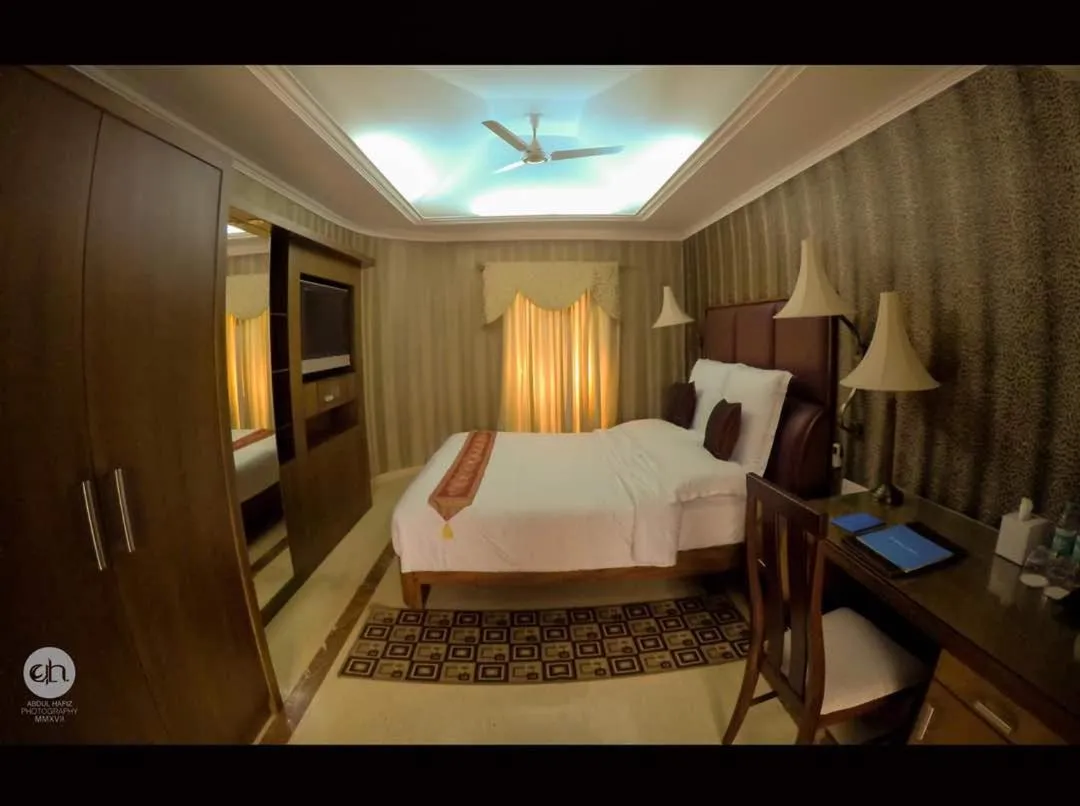 Bedroom, Bed in SAJ Earth Resort & Convention Center , Kochi