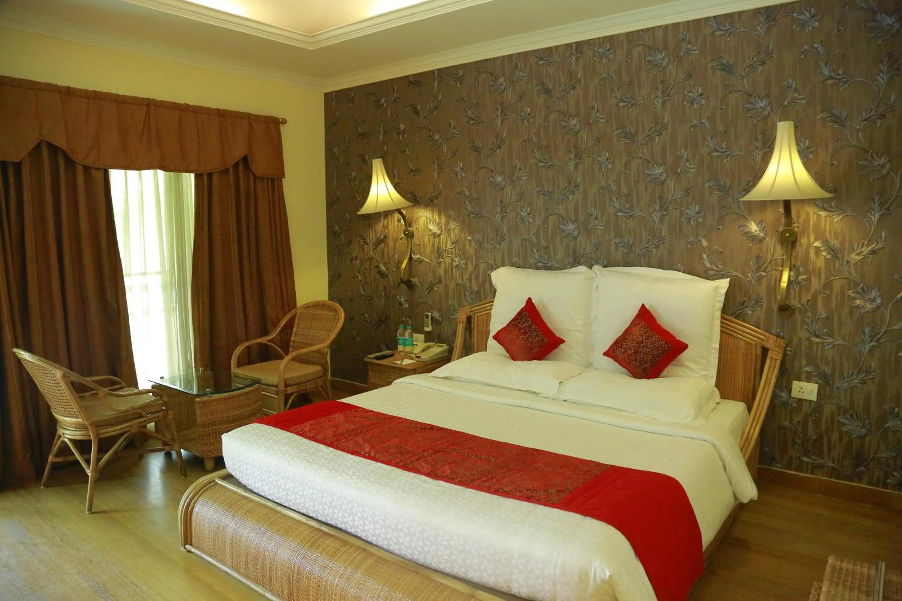 Bedroom, Bed in SAJ Earth Resort & Convention Center , Kochi