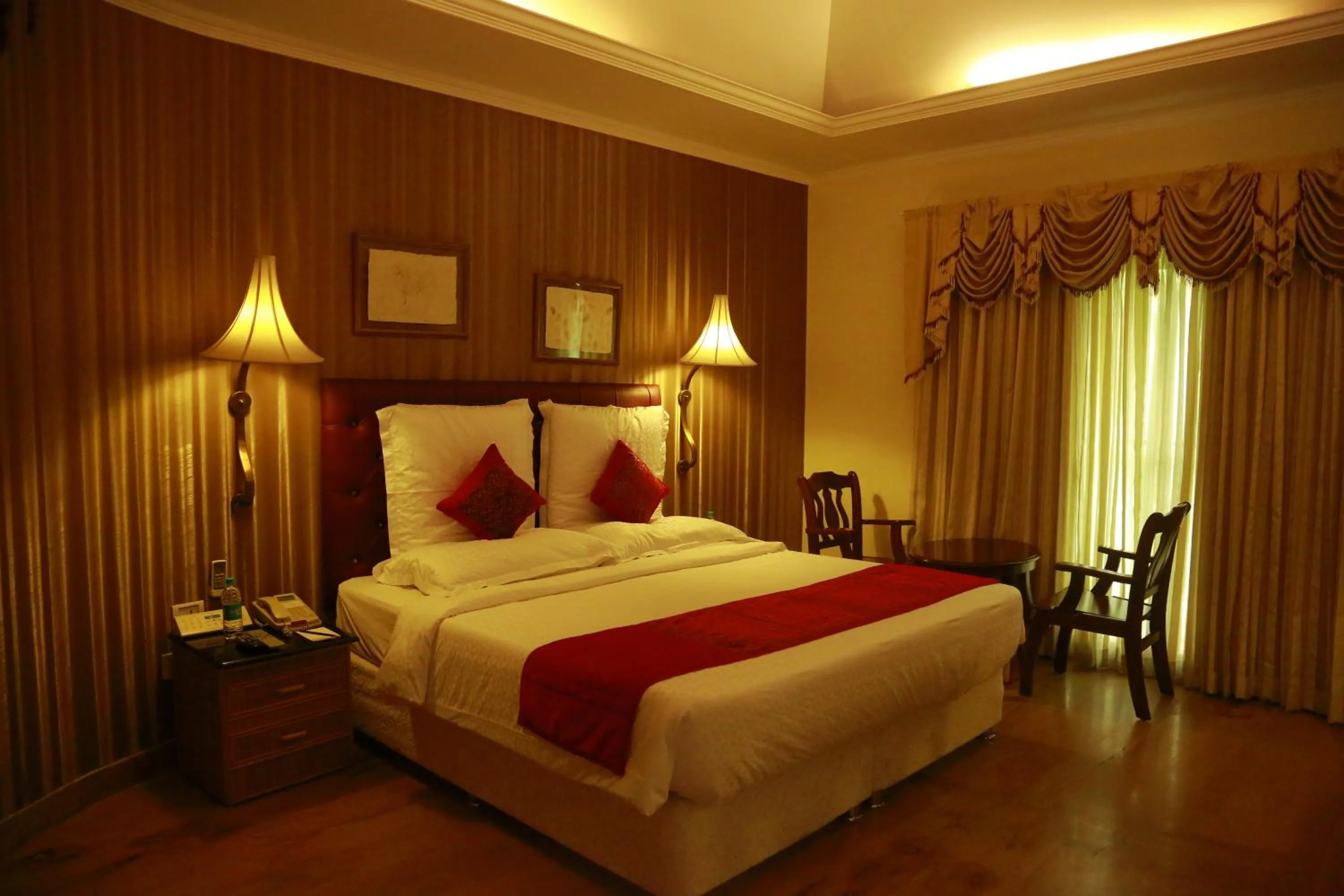 Bedroom, Bed in SAJ Earth Resort & Convention Center , Kochi