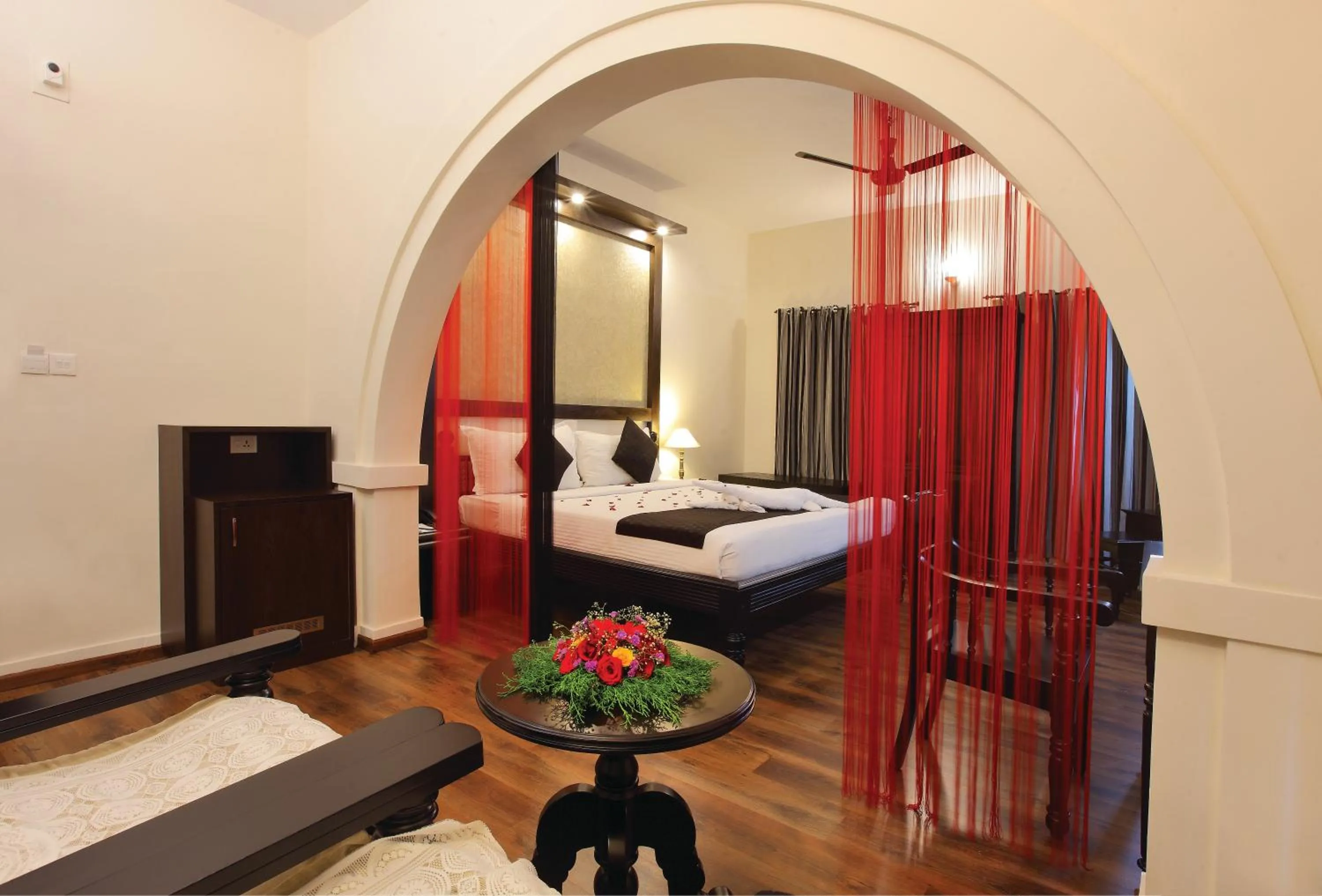 Bed in The River Retreat Heritage Ayurvedic Resort