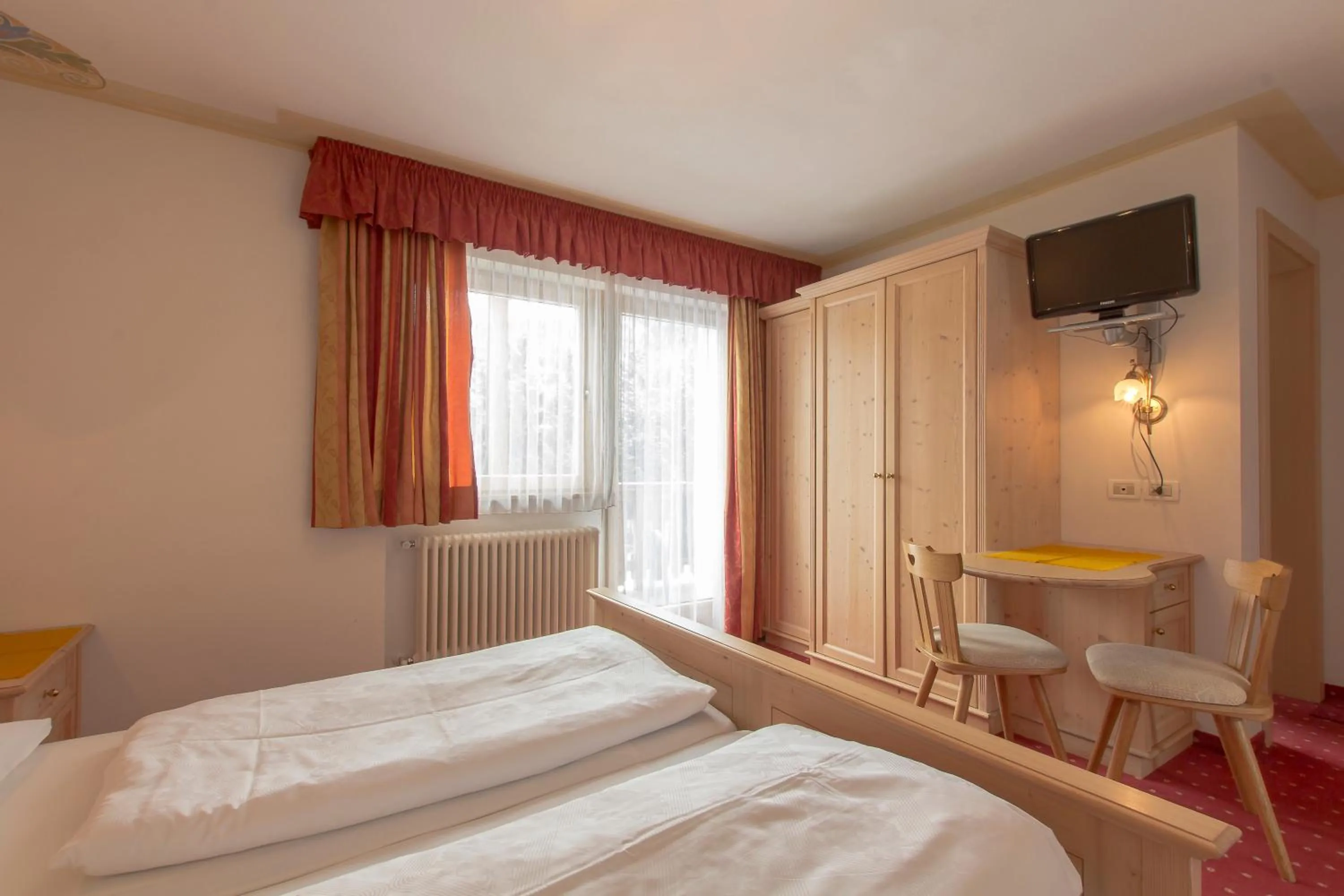 Bed in B&B Apartments La Palsa