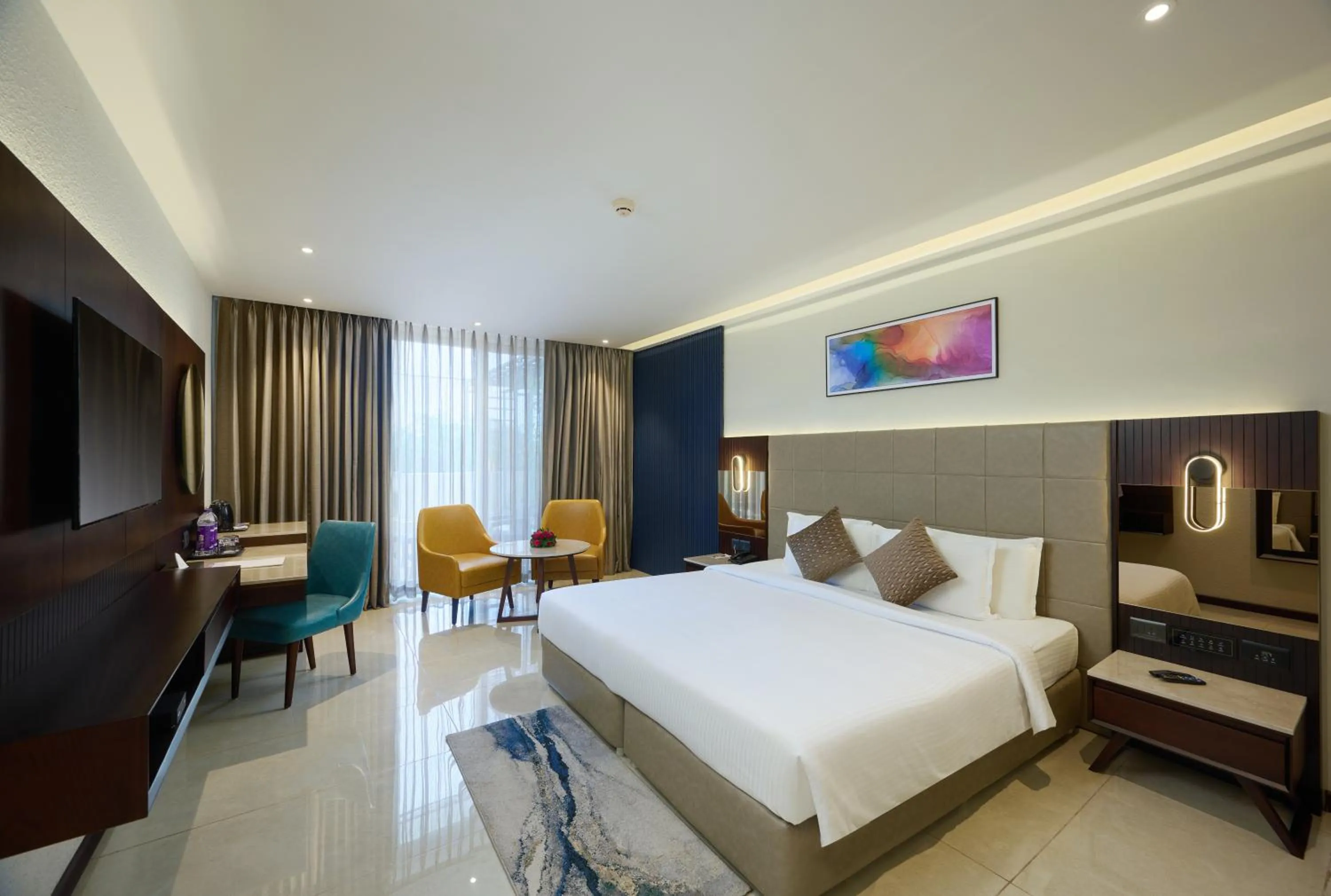 Bed in Flora Airport Hotel and Convention Centre Kochi