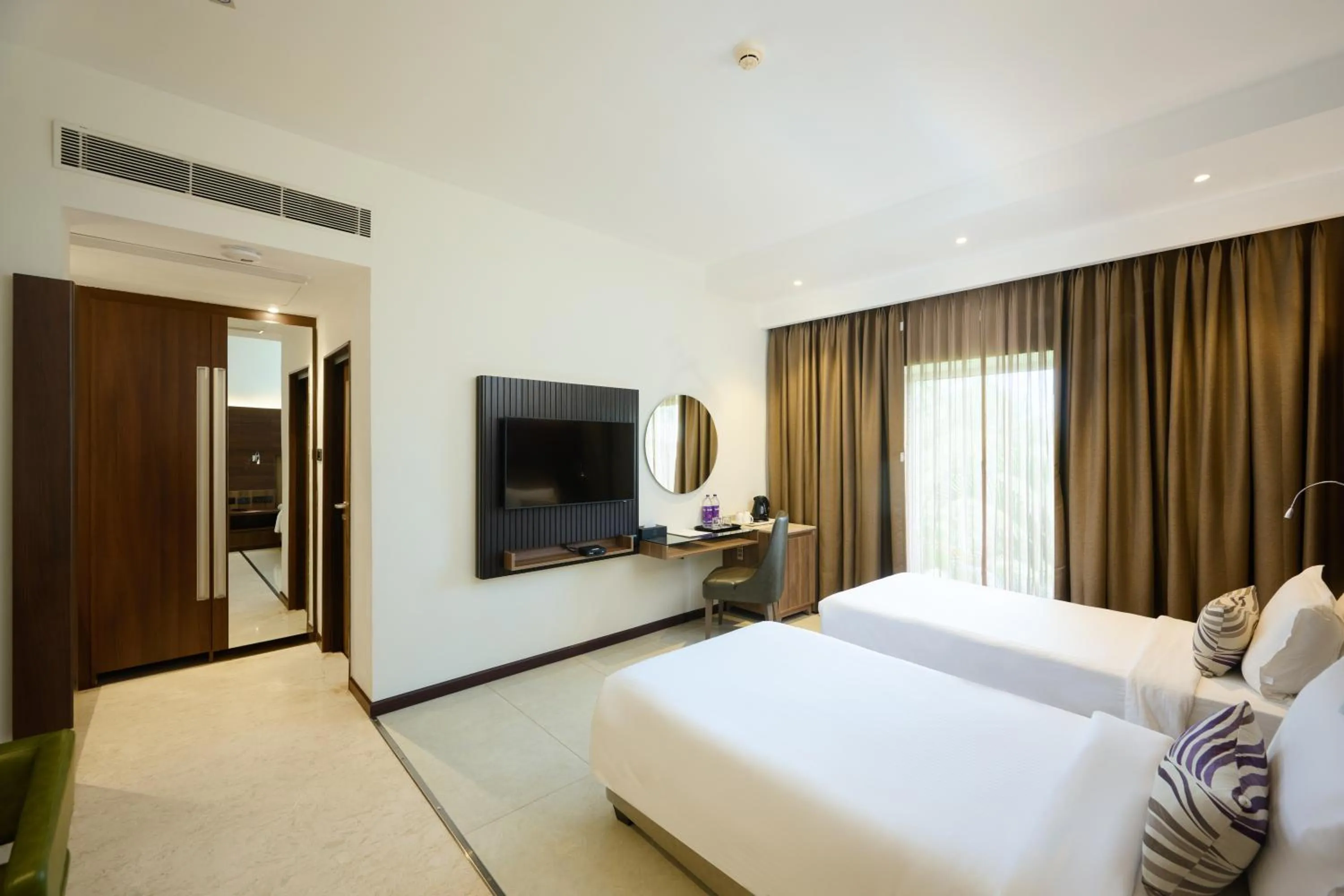 Shower, Bed in Flora Airport Hotel and Convention Centre Kochi