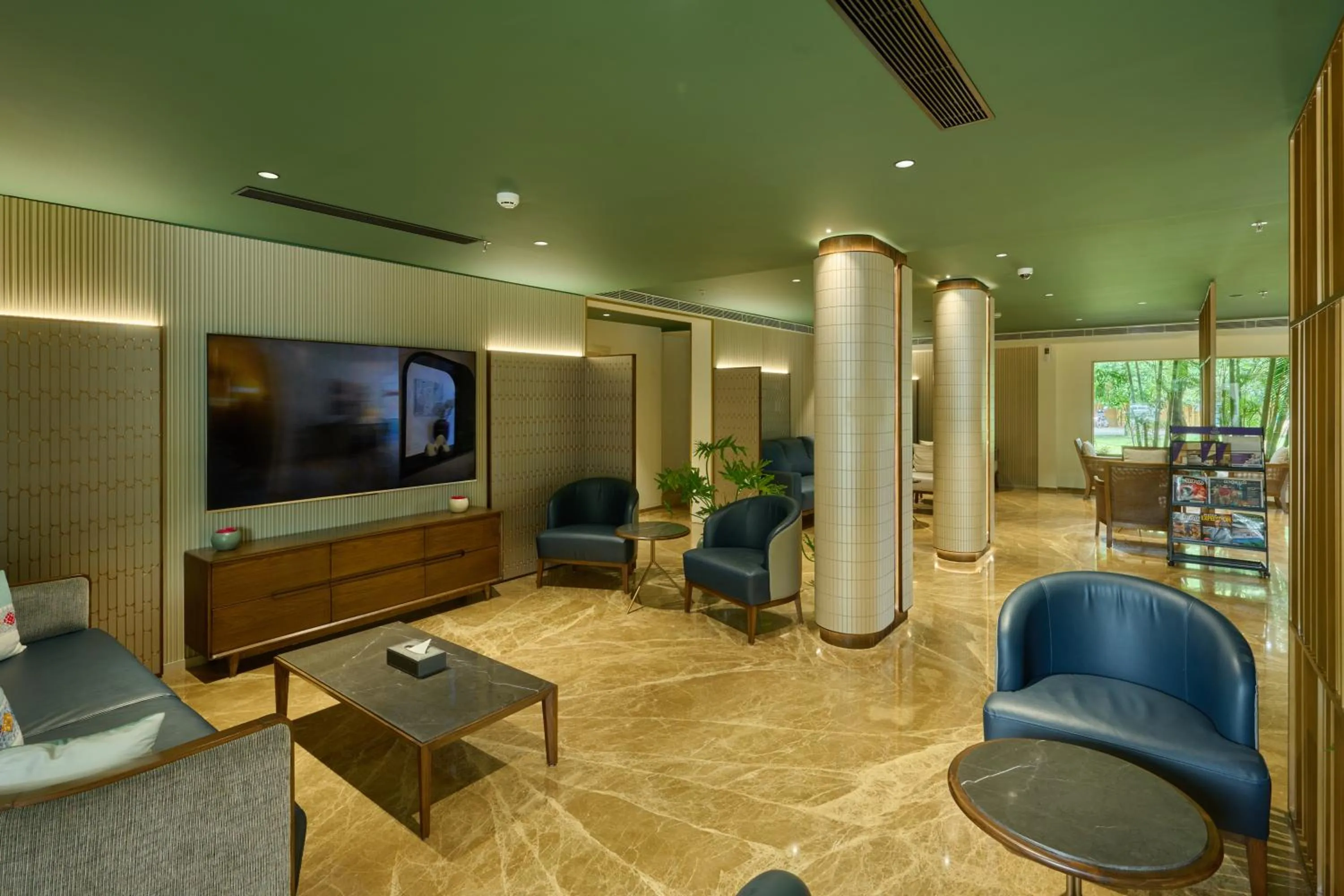 Communal lounge/ TV room in Flora Airport Hotel and Convention Centre Kochi