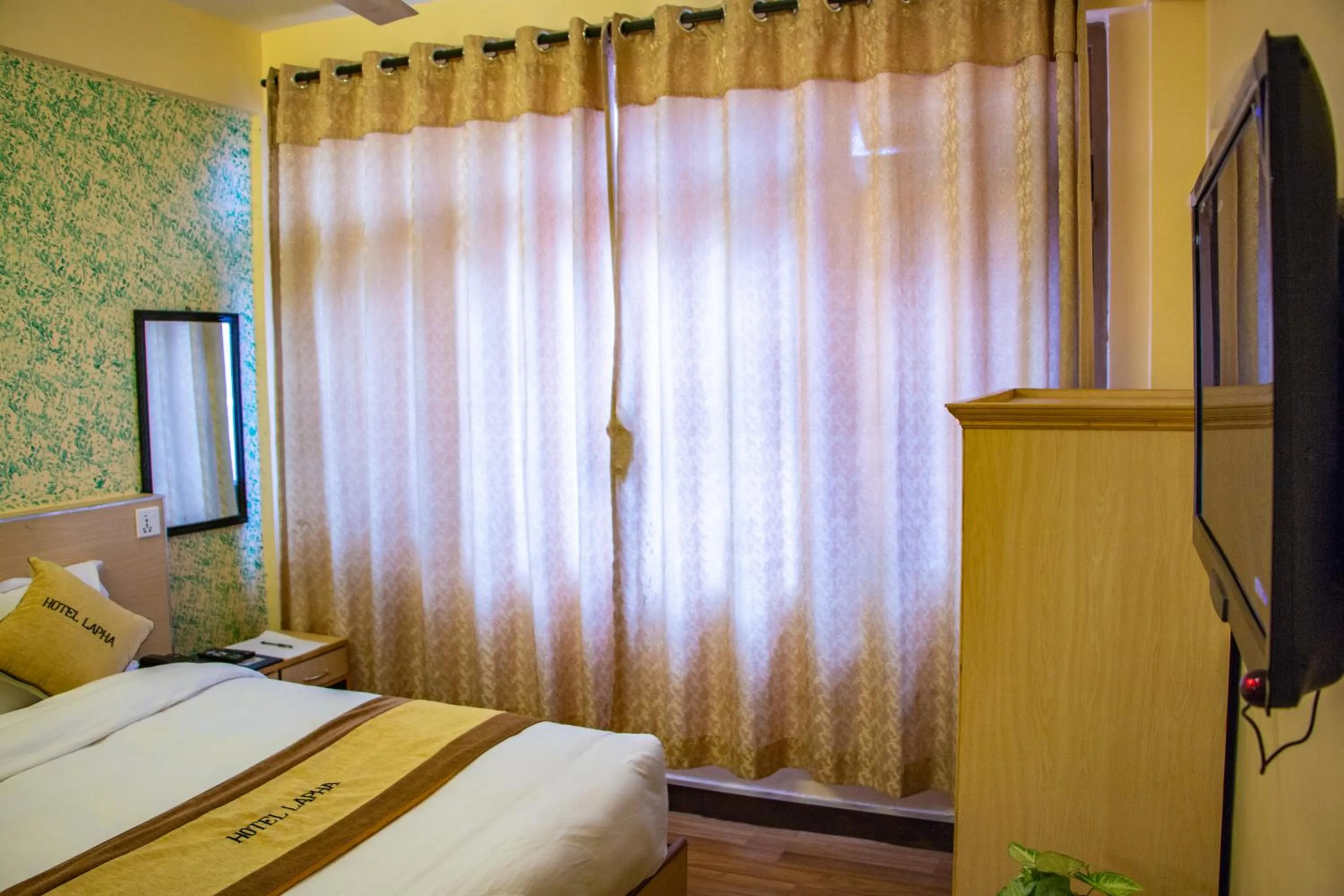 Bed in Hotel Lapha
