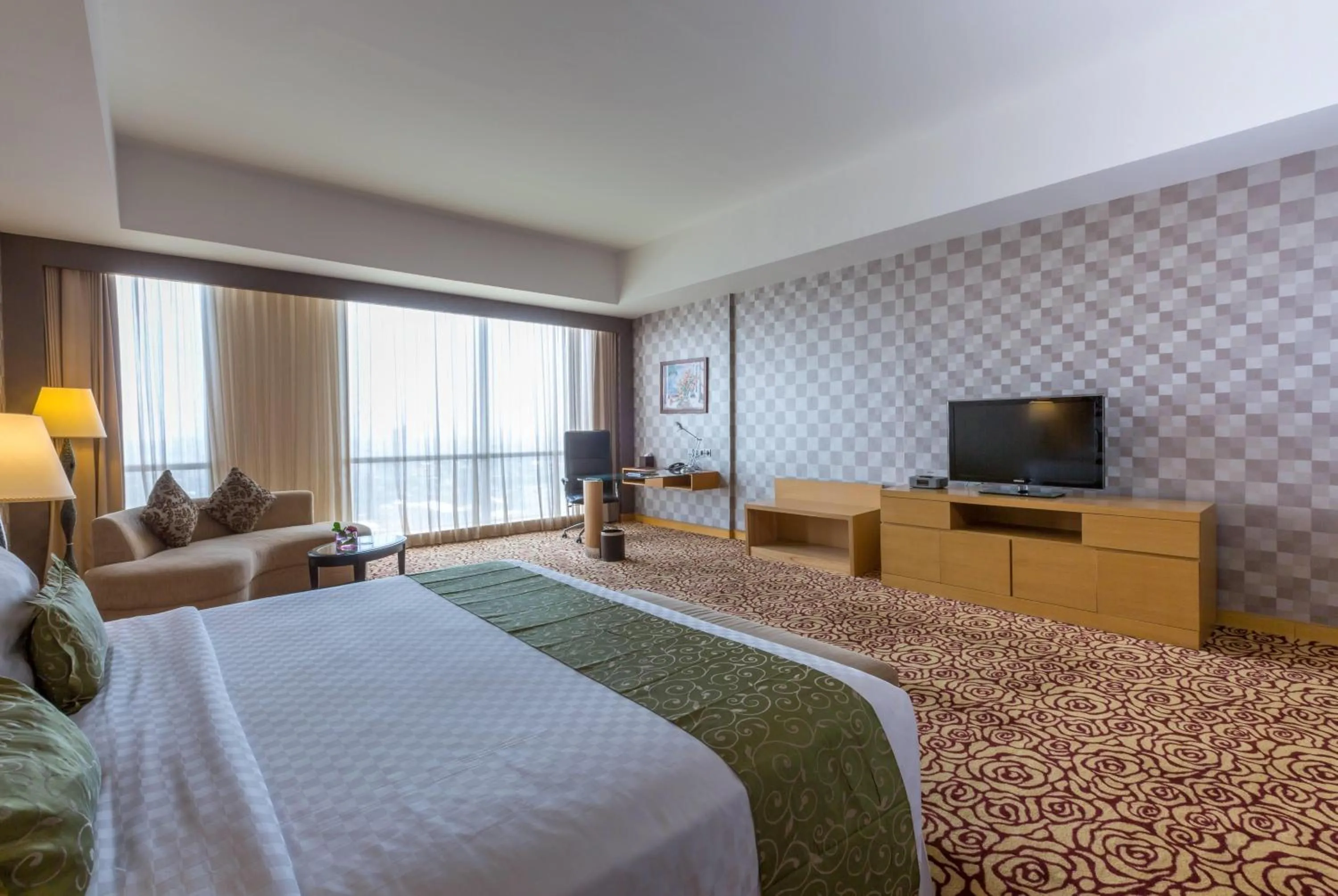 Photo of the whole room, Bed in Wyndham Surabaya