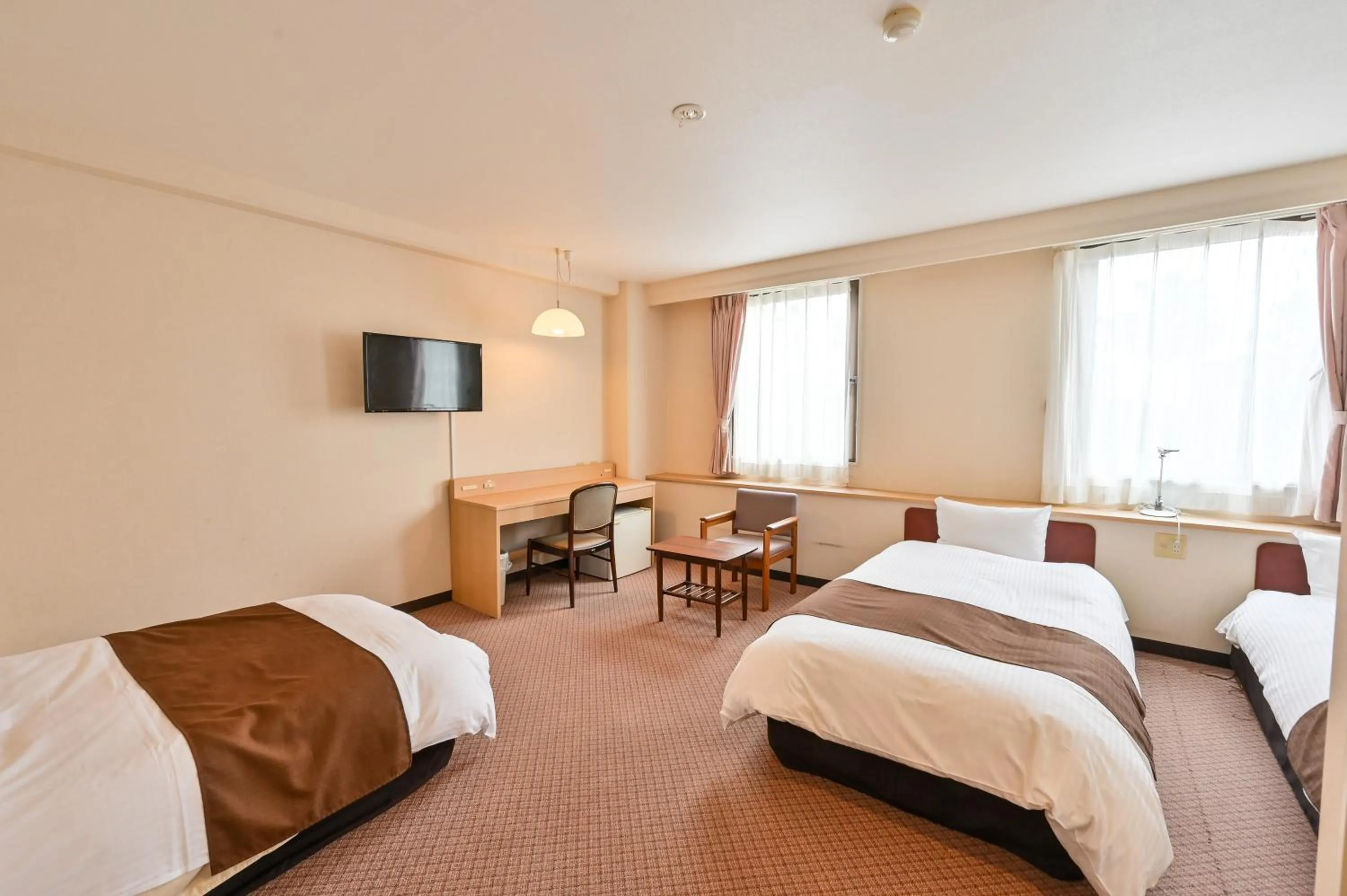 Bed in Kagoshima Daiichi Hotel Kamoike