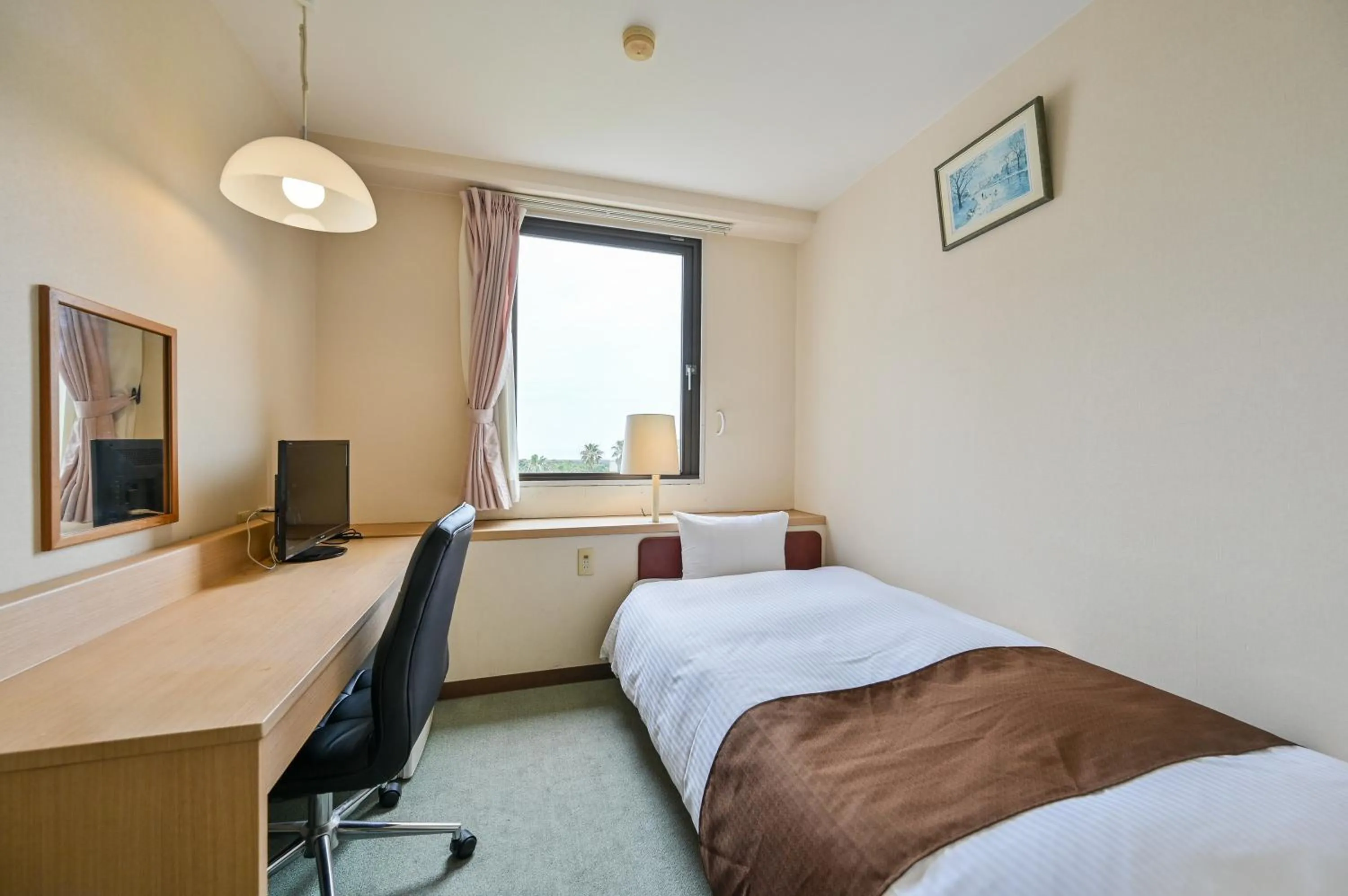 Bed in Kagoshima Daiichi Hotel Kamoike