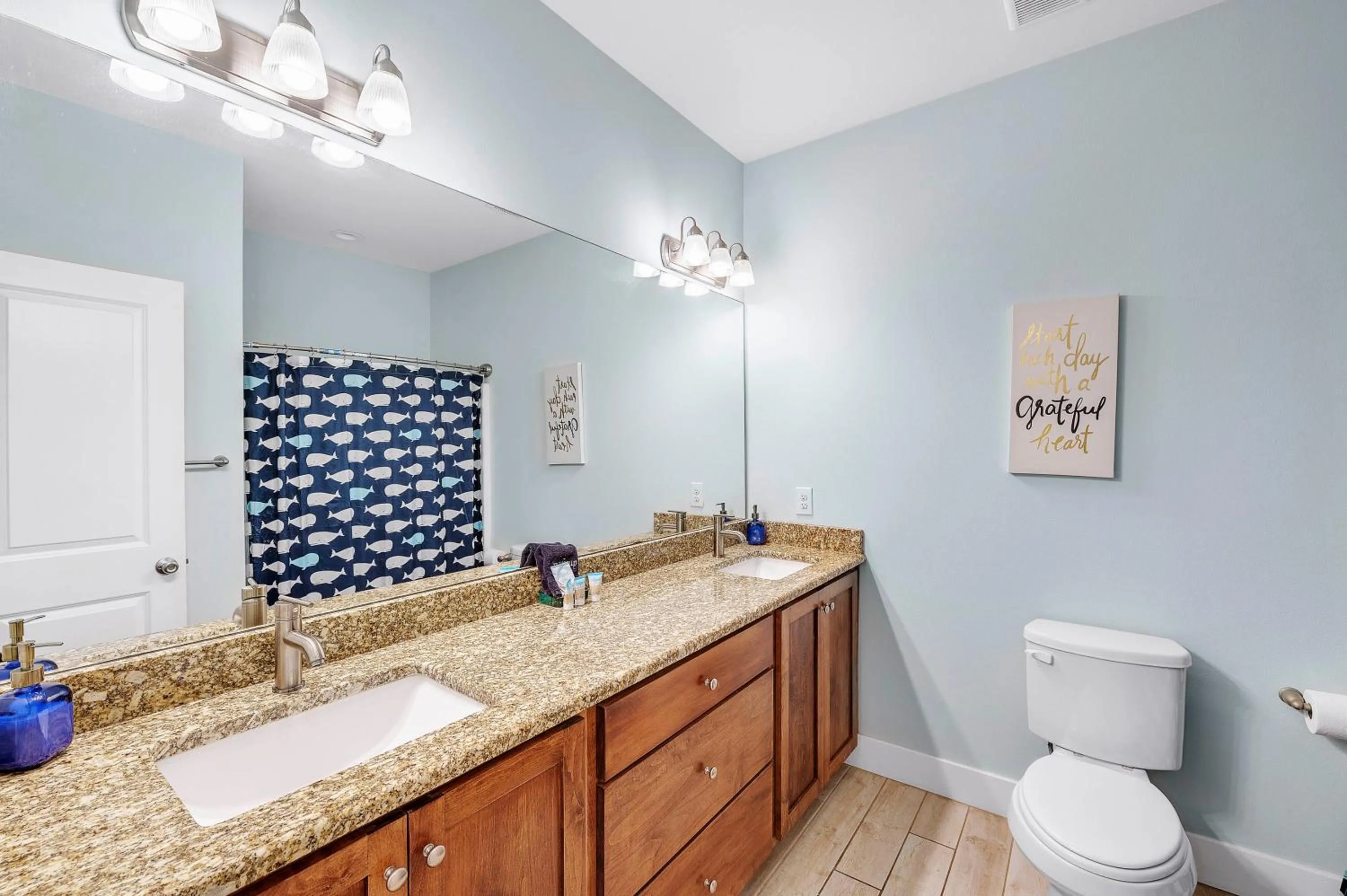 Toilet in TRUE BLUE-Coastal cottage-3 min walk to beach! POOL!