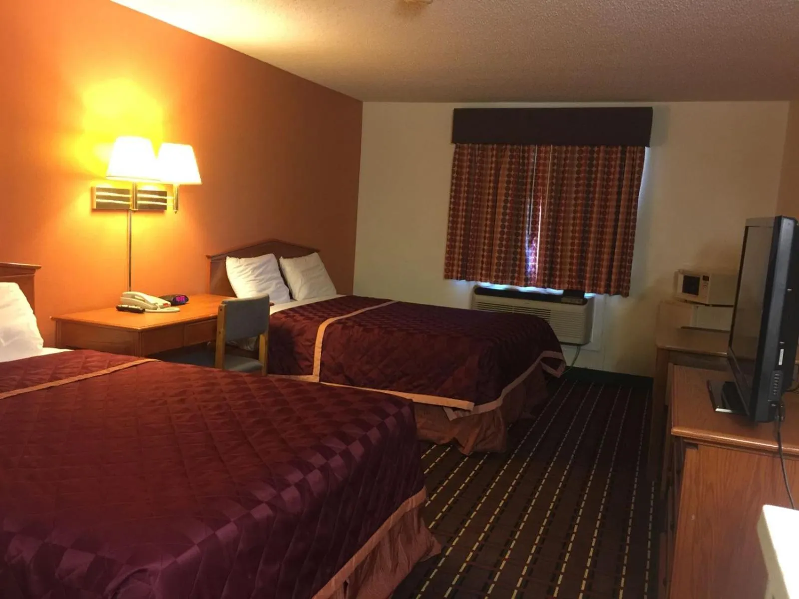 Bed in Texas Inn and Suites Lufkin
