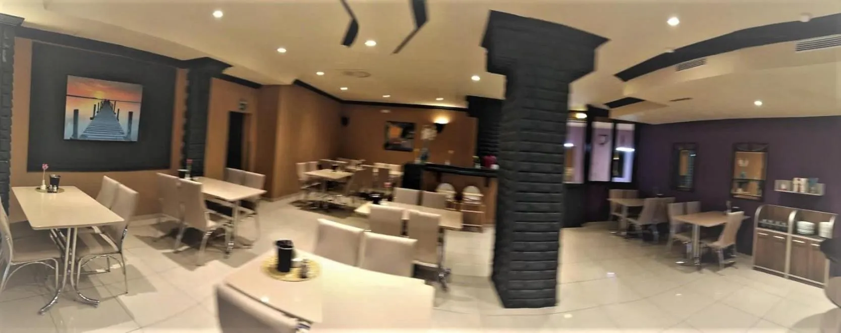 Dining area in M&A Cityhotel Hildesheim