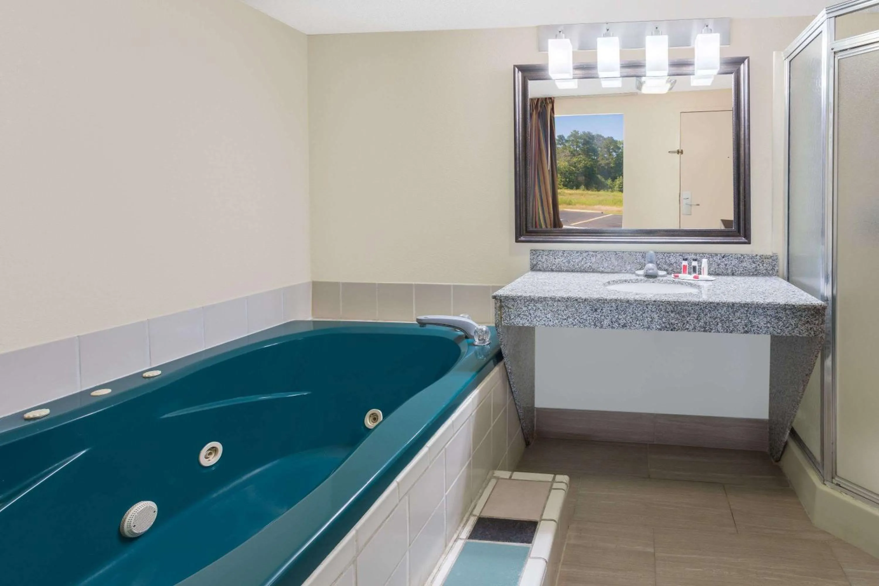 Bathroom in Days Inn by Wyndham Newberry South Carolina