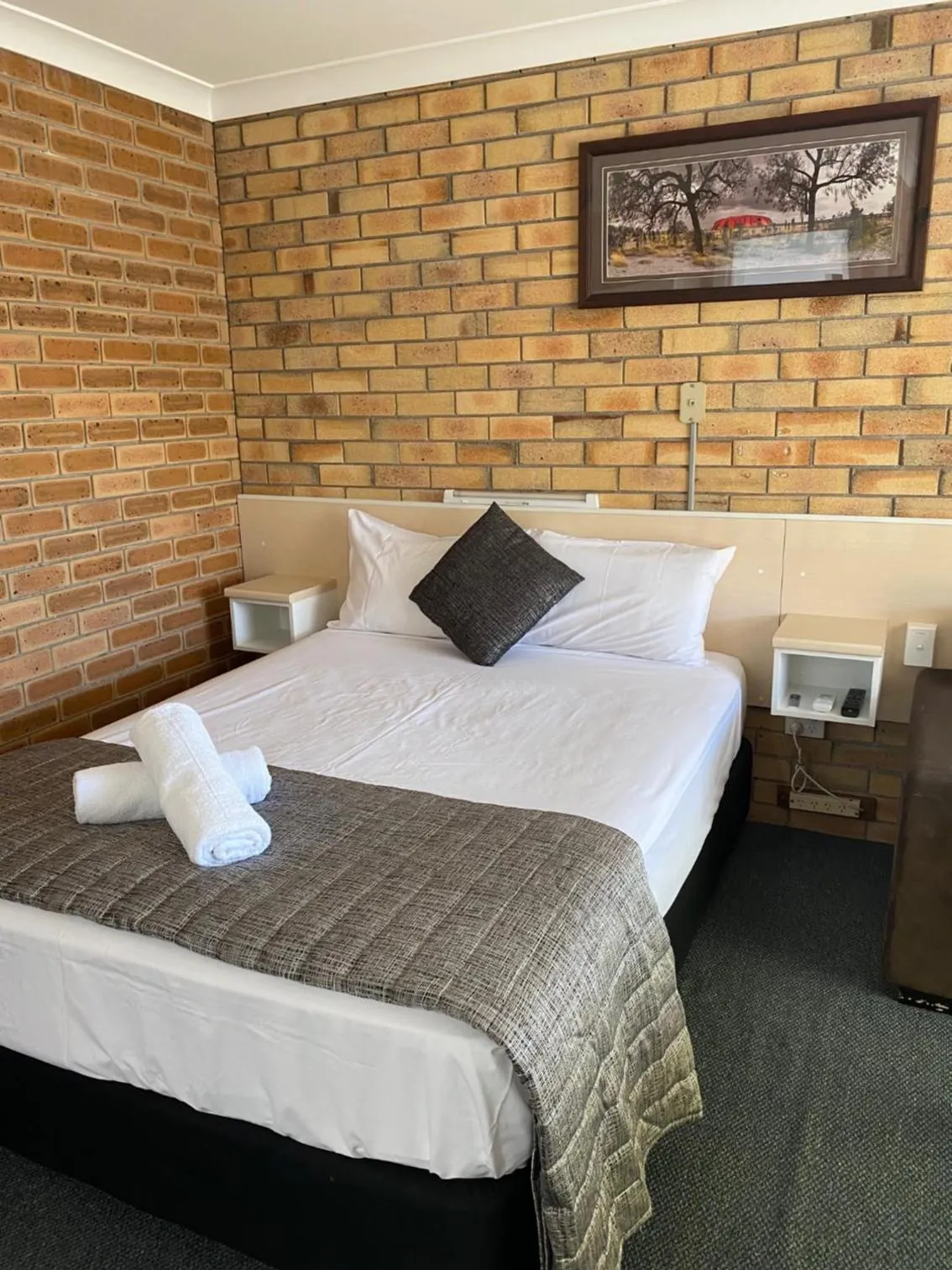 Bed in Buckaroo Motor Inn