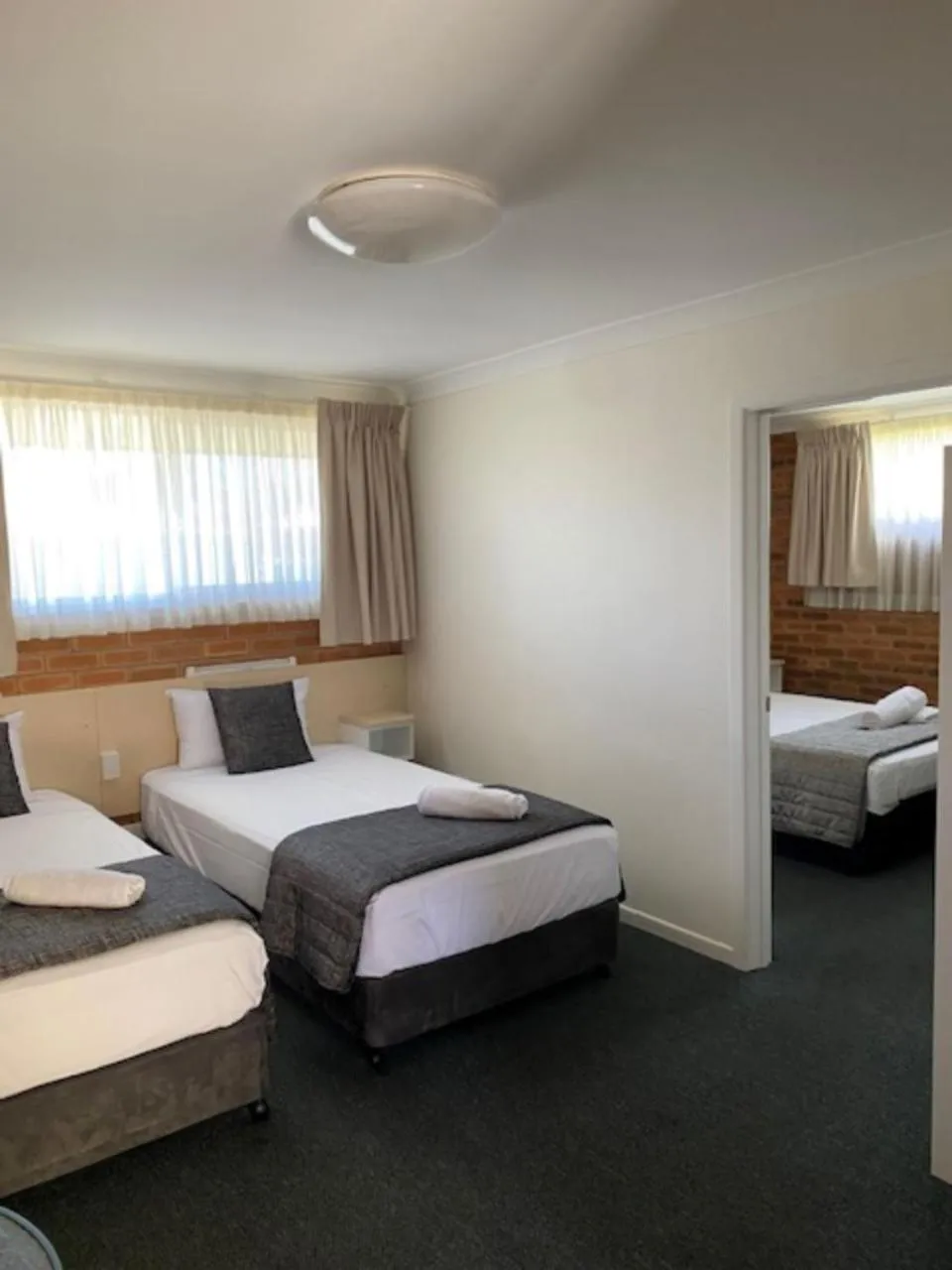 Bed in Buckaroo Motor Inn