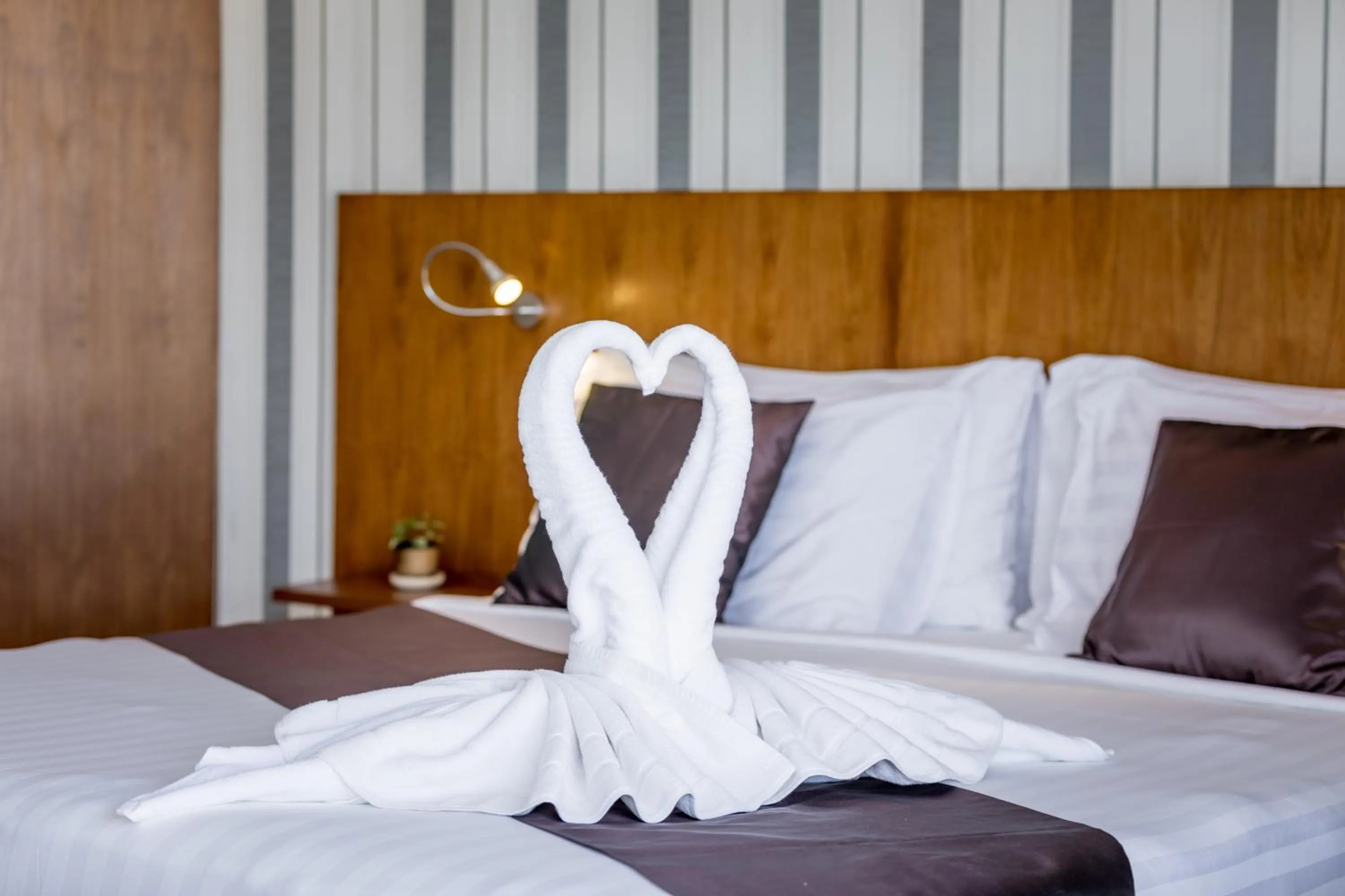 Bed in Beluga Boutique Hotel