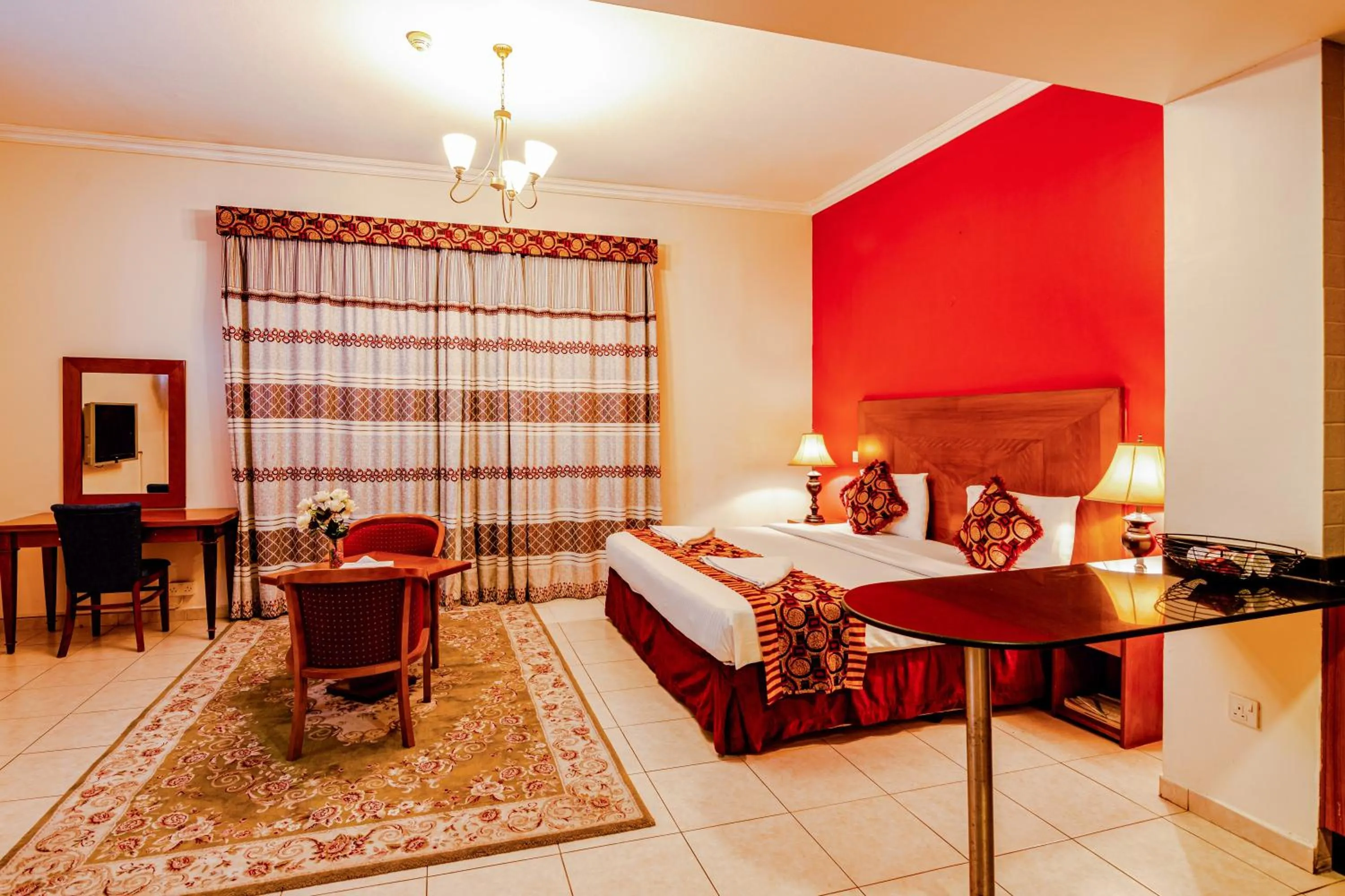 Bed in Icon Hotel Apartments