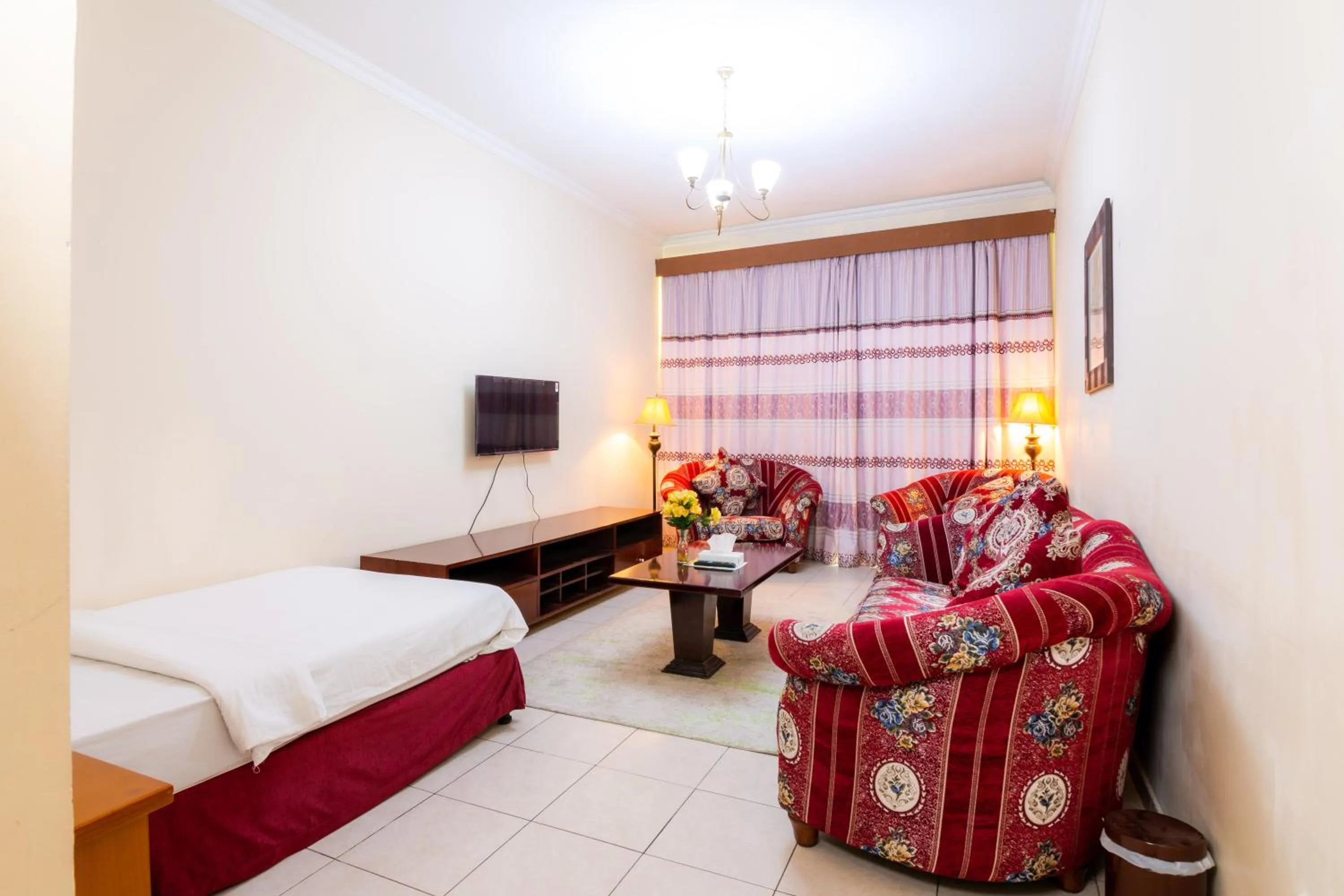 Bed in Icon Hotel Apartments