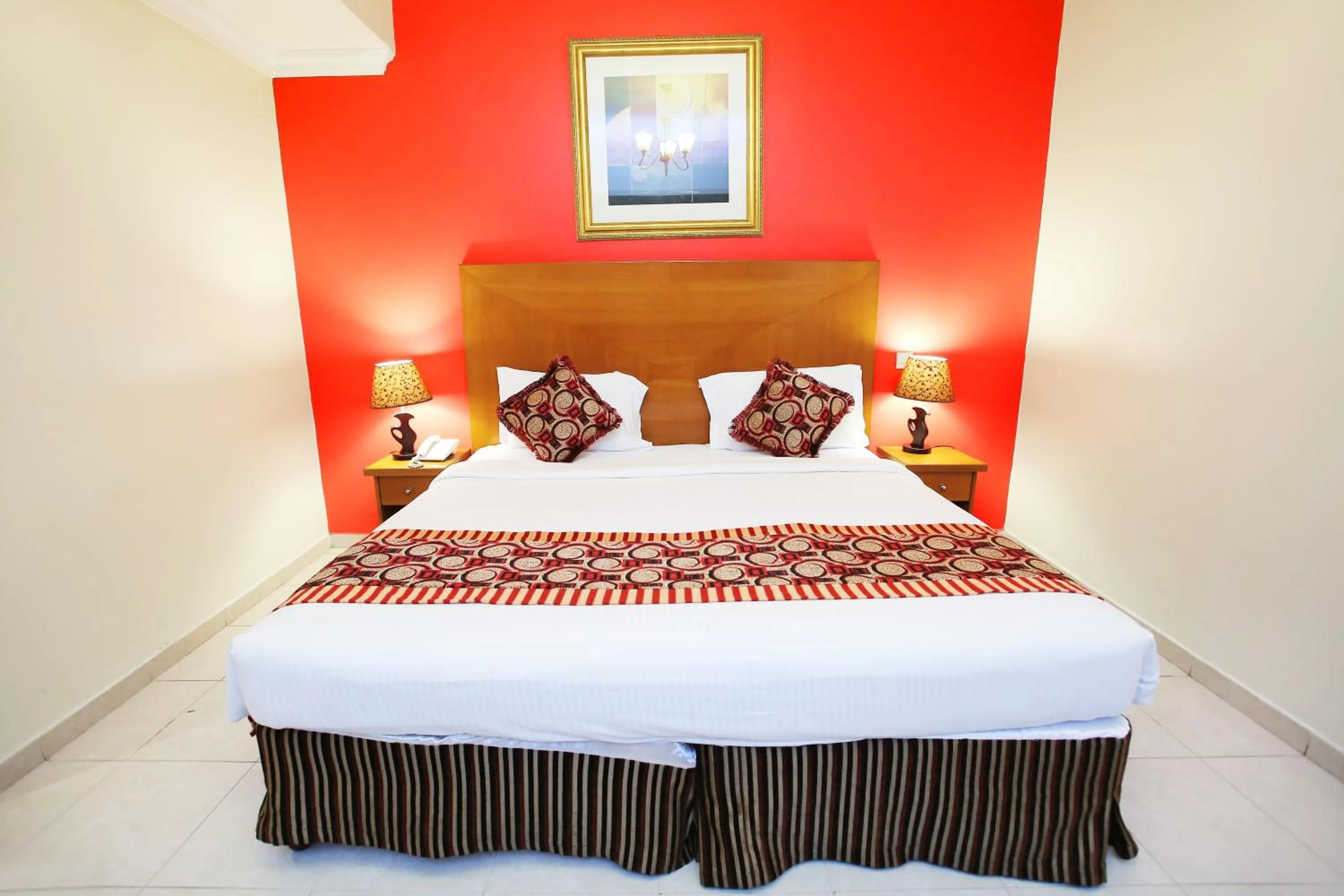 Bed in Icon Hotel Apartments