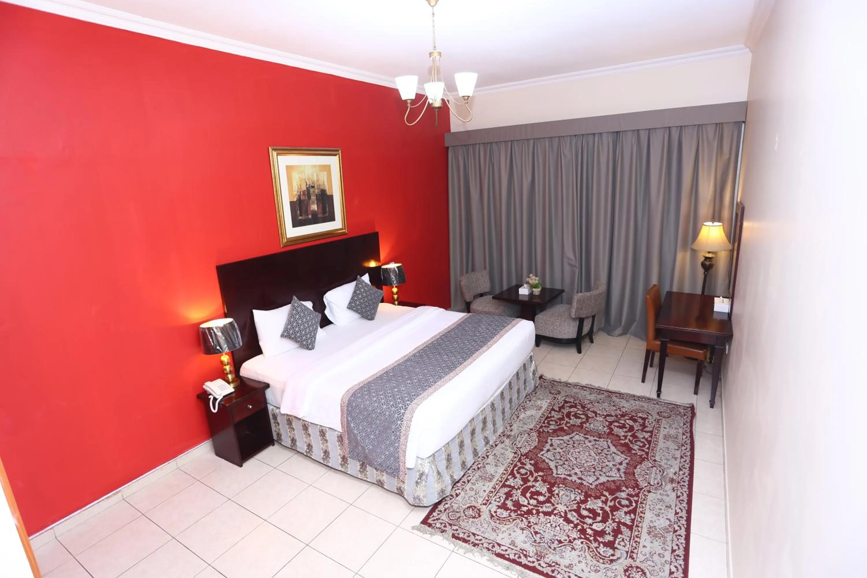 Bed in Icon Hotel Apartments