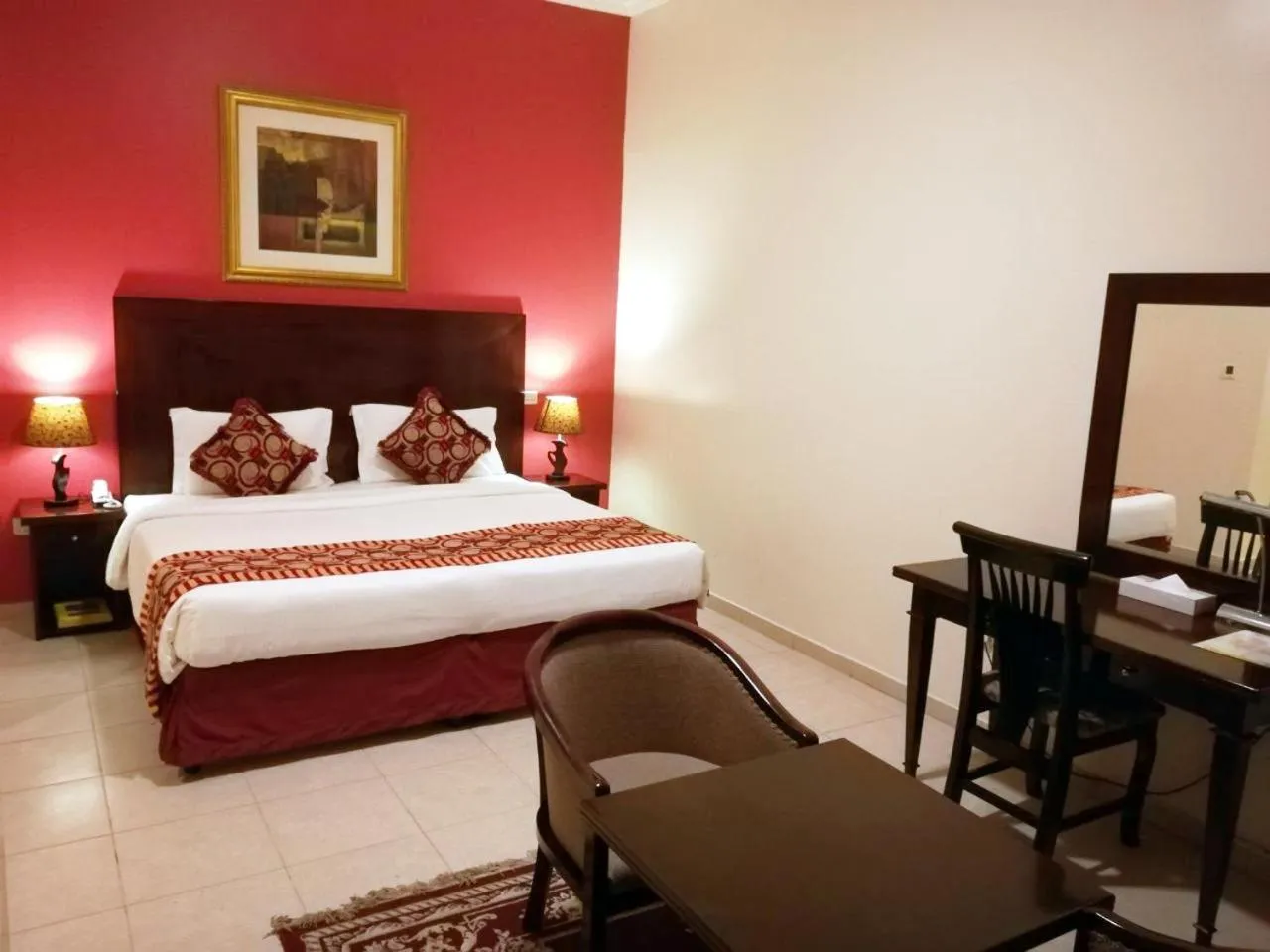 Bed in Icon Hotel Apartments